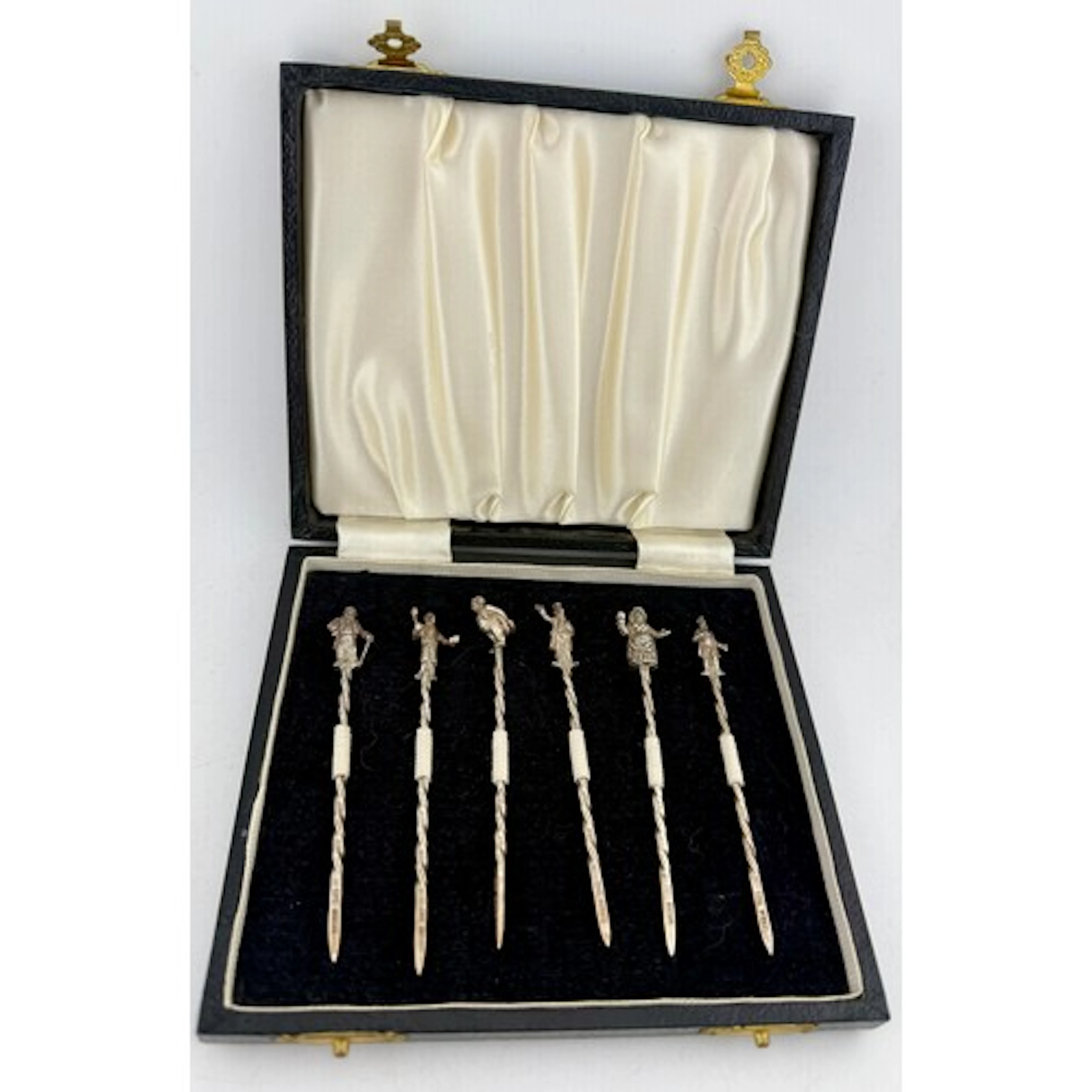 A boxed set of hallmarked silver Dickens character cocktail ...