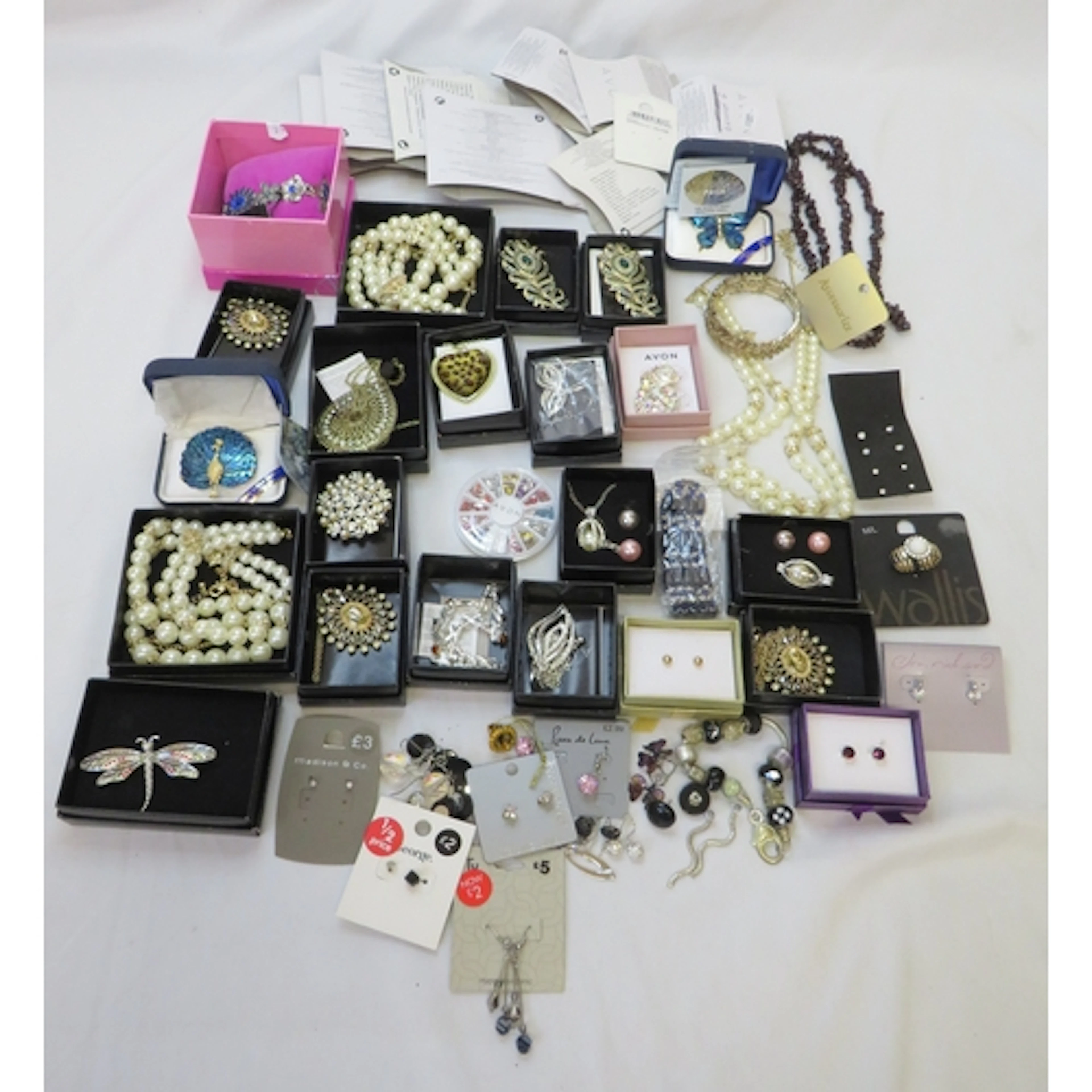 Large Quantity Avon Jewellery as new plus some loose costume...