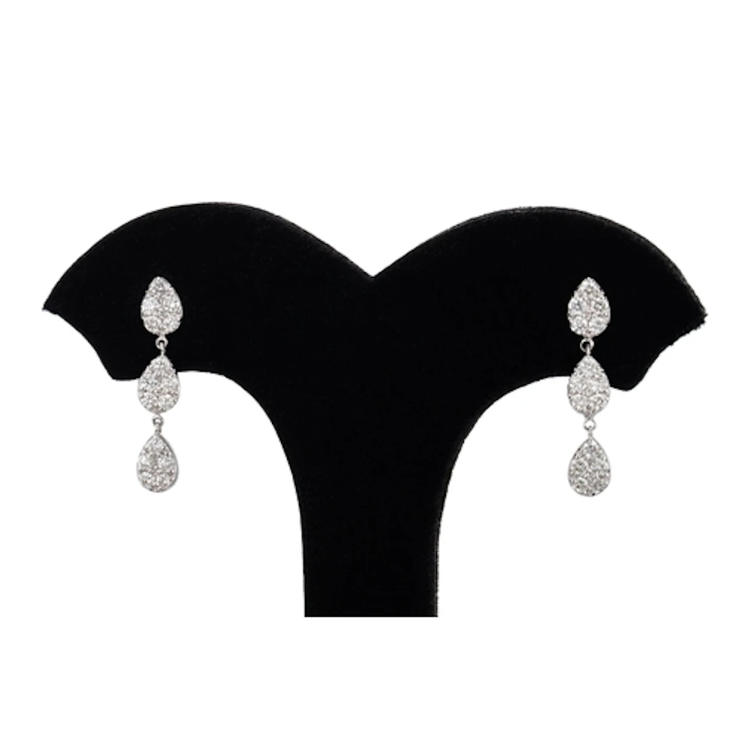 A PAIR OF DIAMOND TEARDROP CLUSTER EARRINGS, the triple tear...