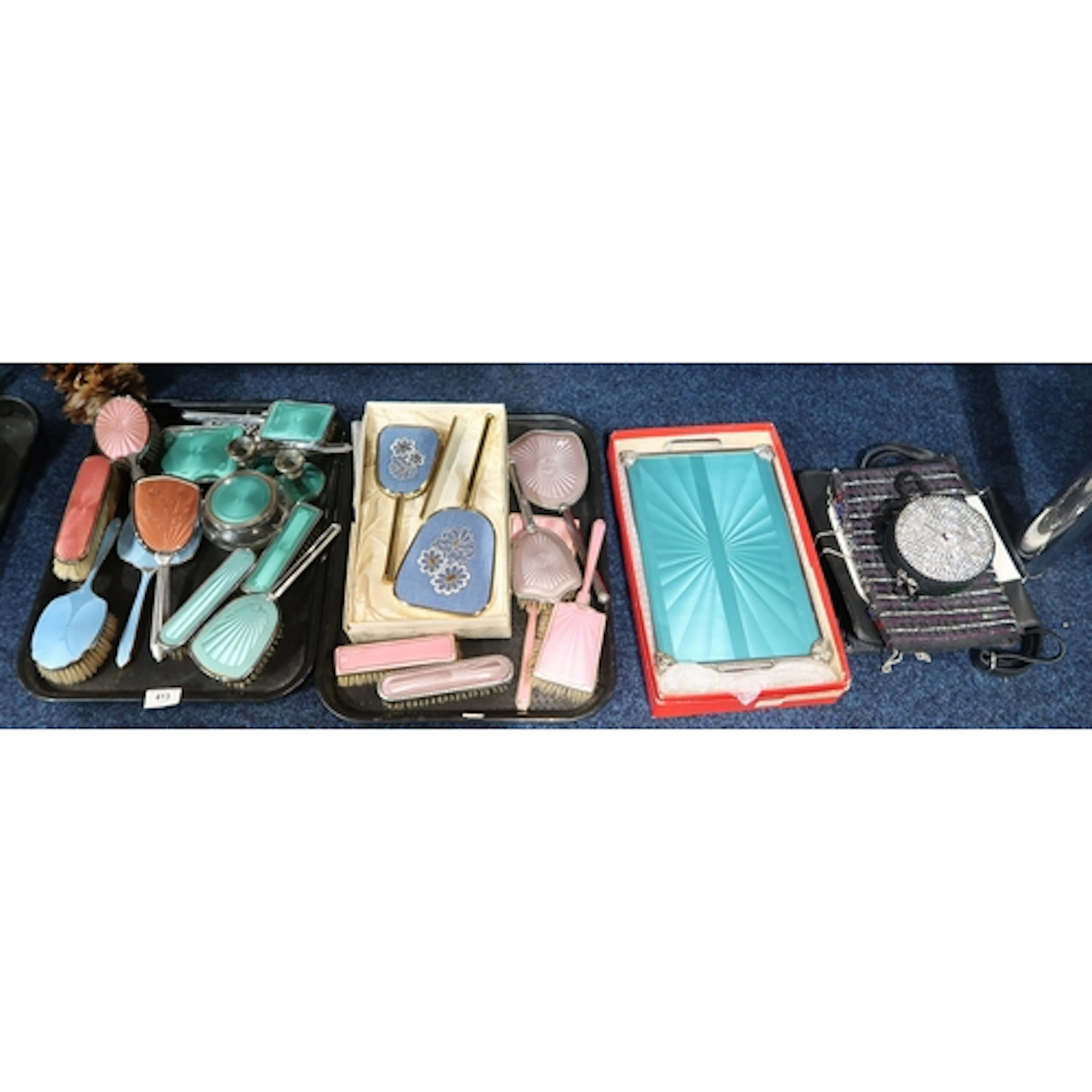 A collection of guilloche enamel and other dressing table se...