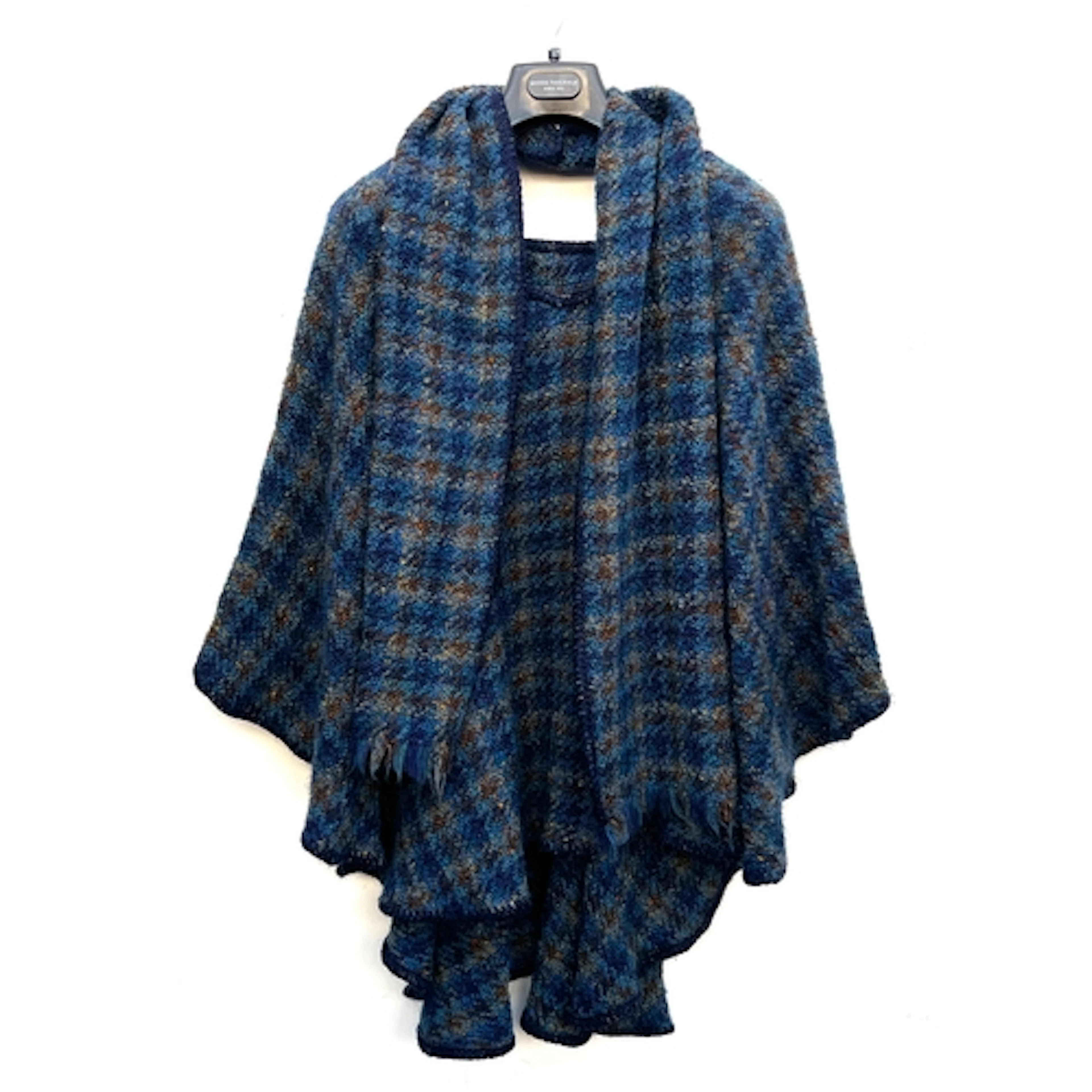 The Muirfield collection, a blue tartan wool poncho and scar...