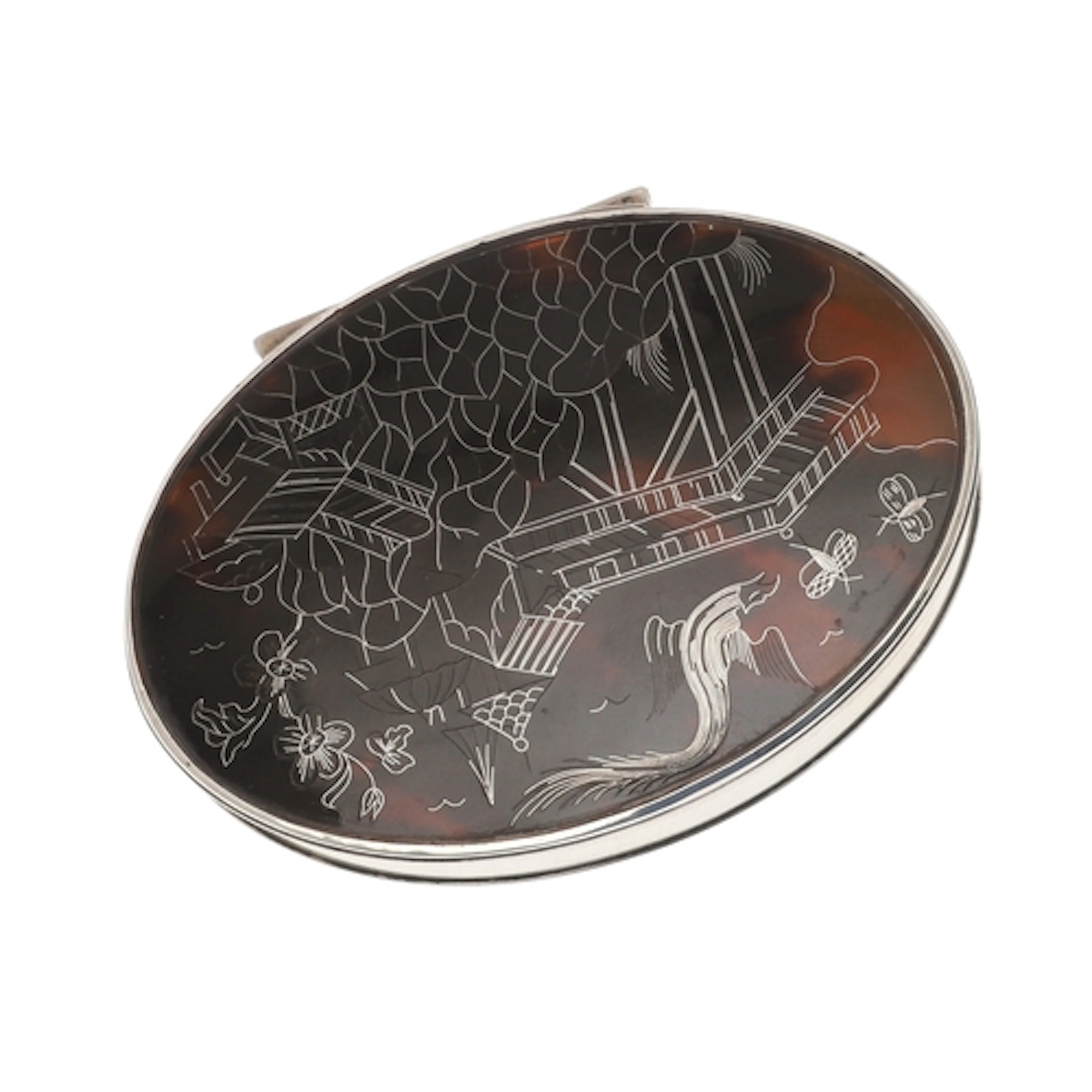 A SILVER AND TORTOISESHELL SNUFF BOX. oval, the cover with s...
