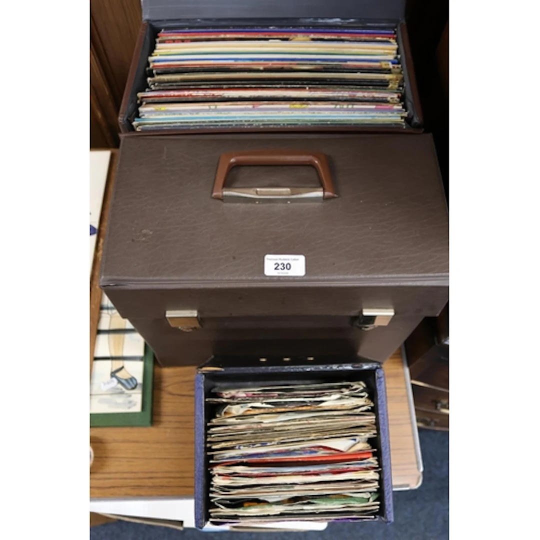 Three cases containing LPs, singles and 78s including Jim Re...