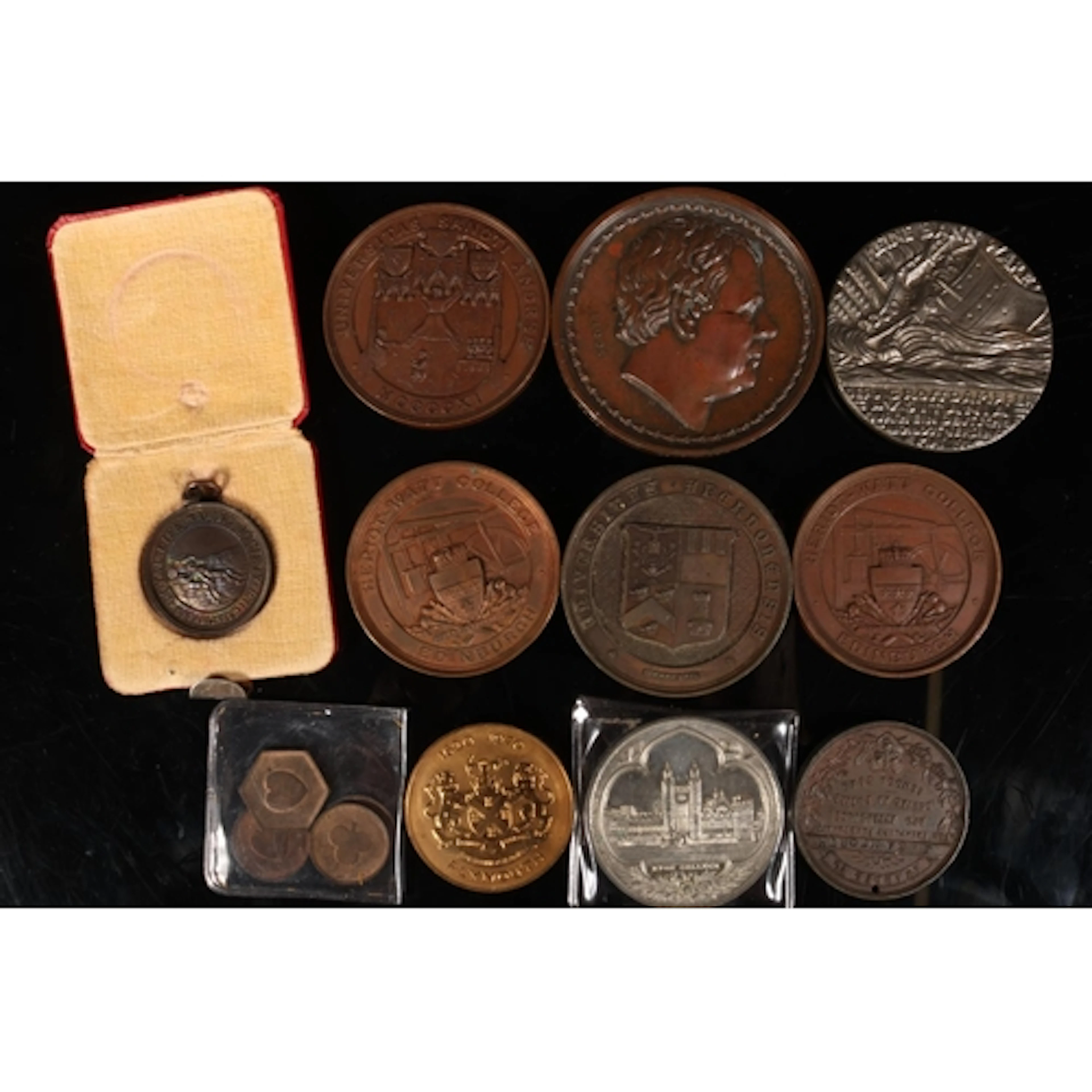 Scholastic and other medals to include a bronze medal by Alf...