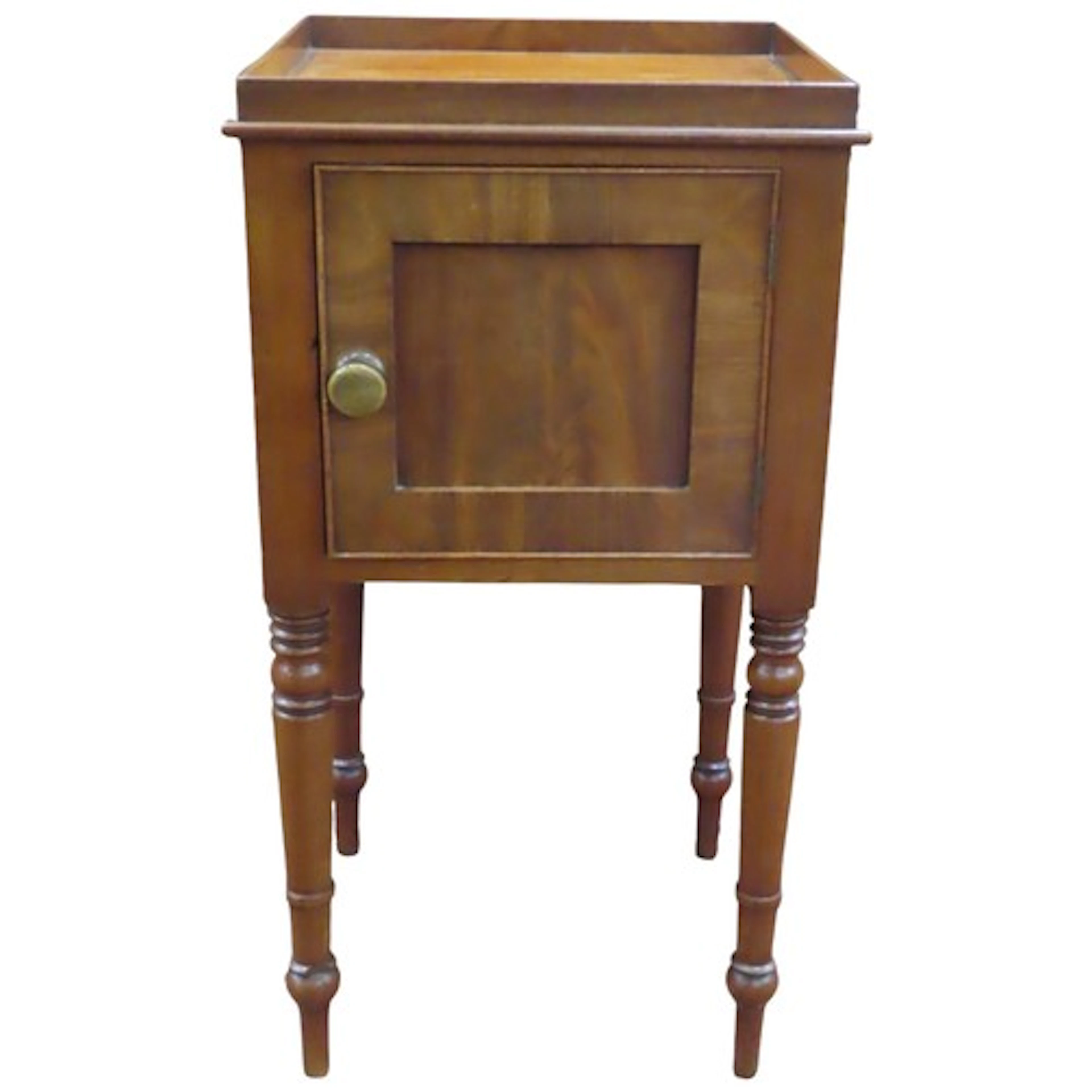 A Victorian mahogany bedside or lamp table with a panelled d...