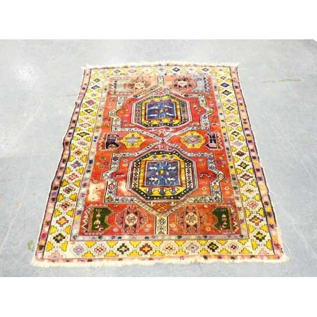 Kazak style Persian red ground rug 250 x 140cm.