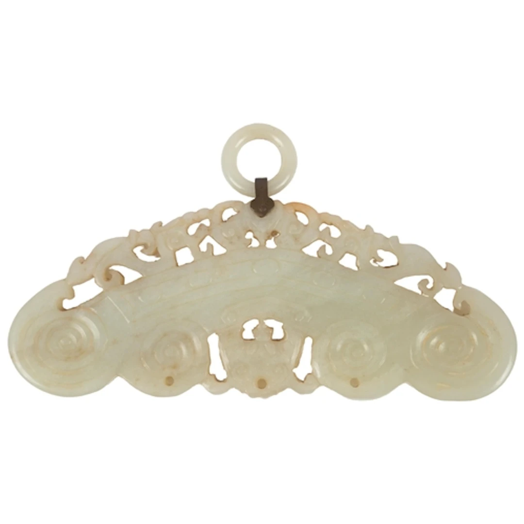 A Chinese pale celadon jade hanging pendant, 19th century, c...