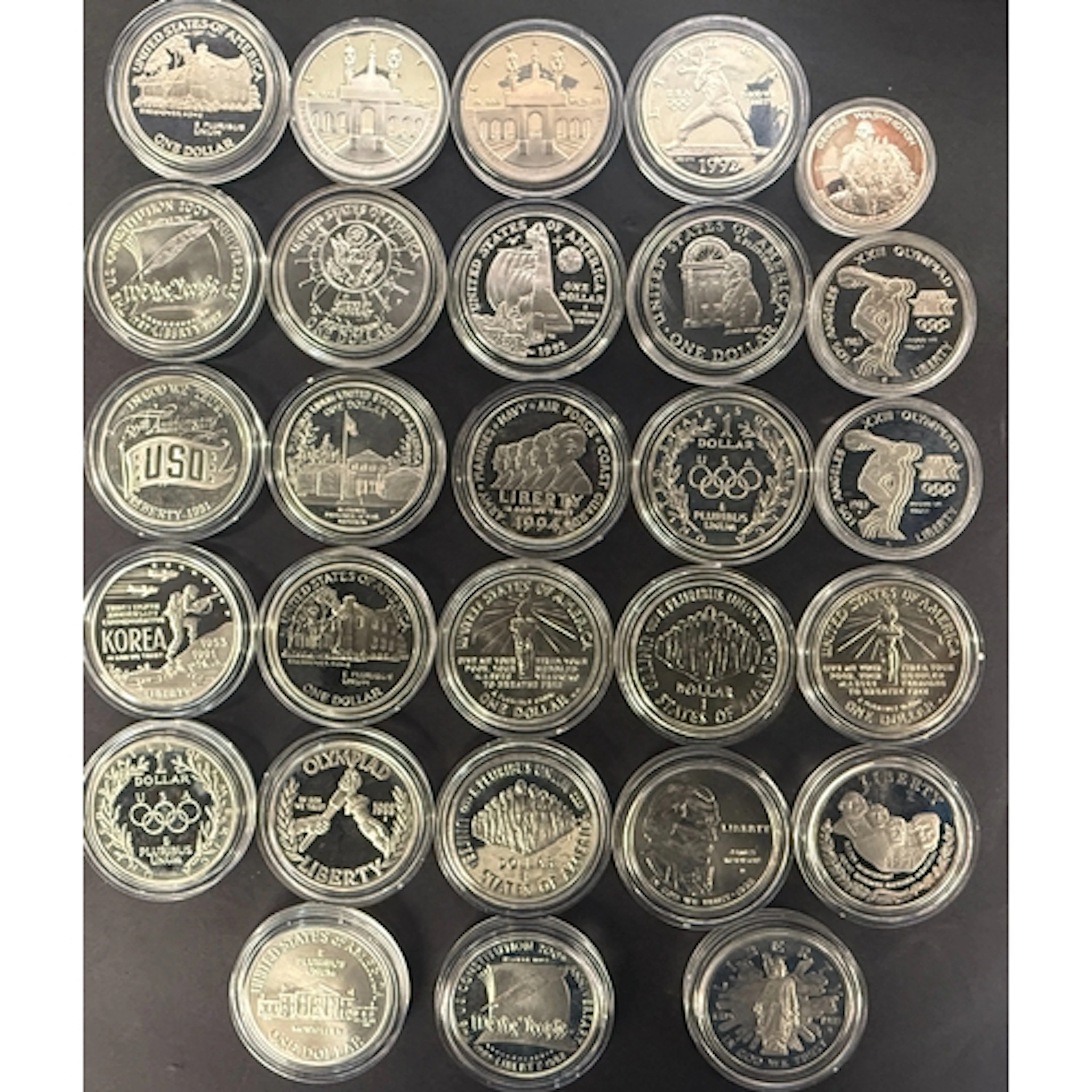 A collection of 27 encapsulated uncirculated USA commemorati...