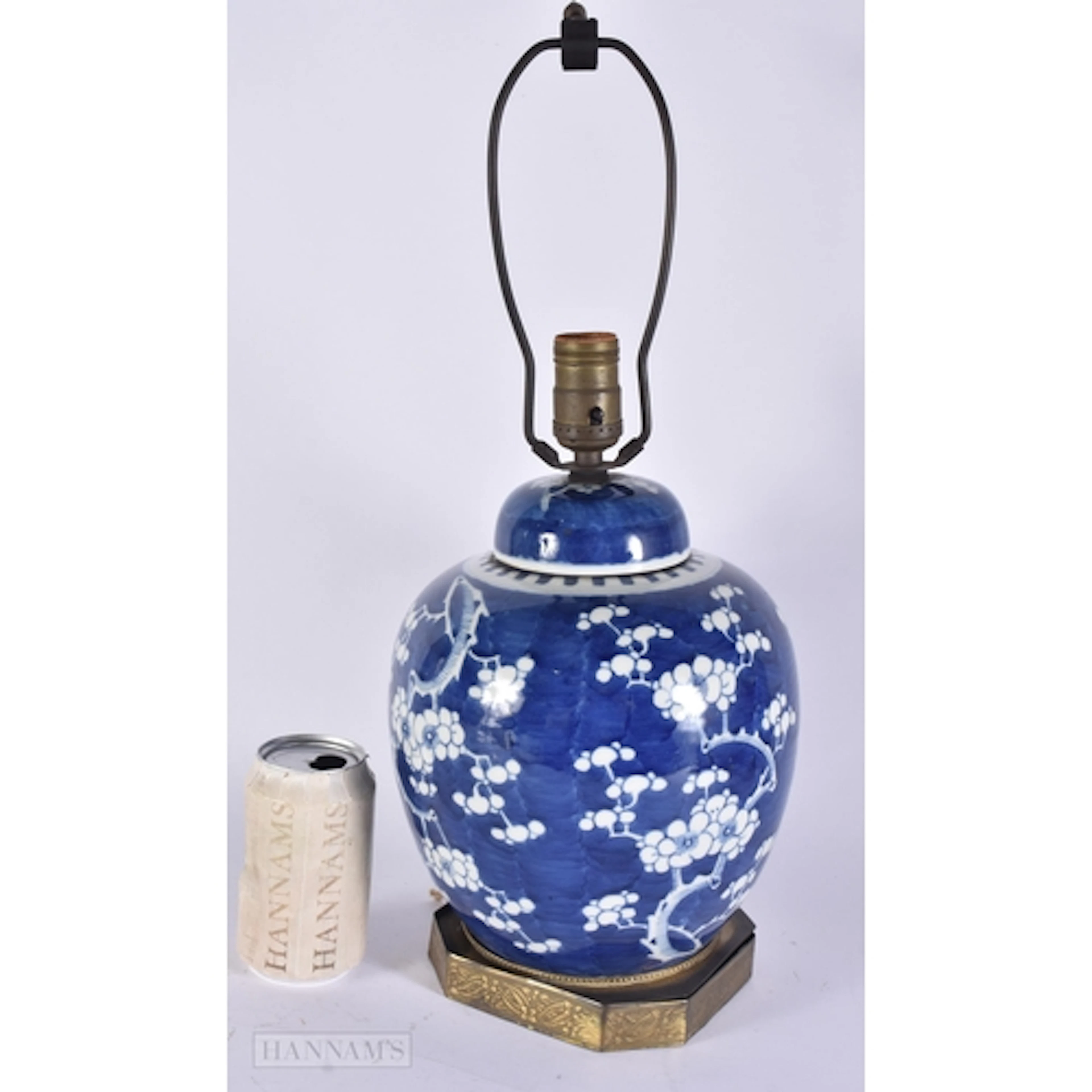 A 19TH CENTURY CHINESE BLUE AND WHITE PORCELAIN PRUNUS LAMP....