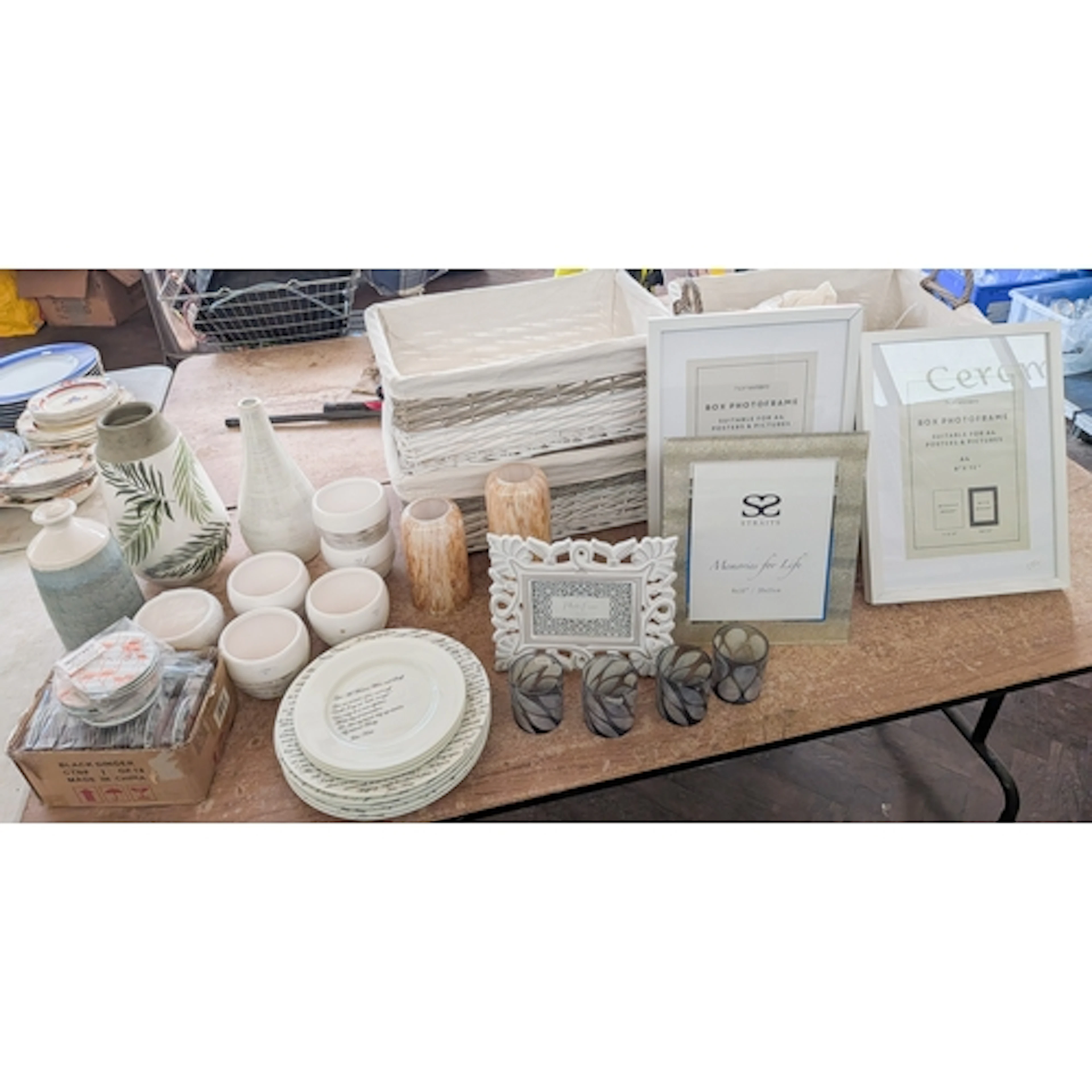 Modern homeware items to include pottery vases, picture fram...