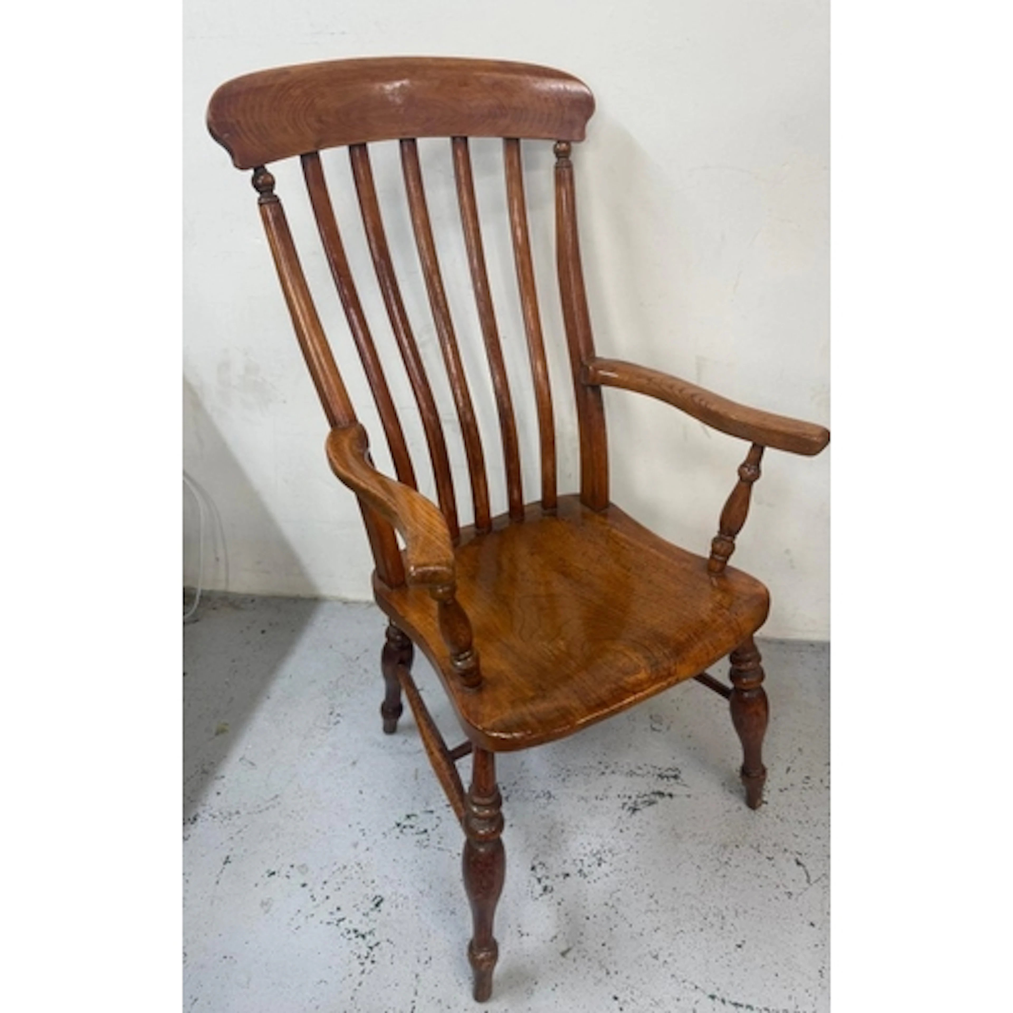 A Windsor open arm chair