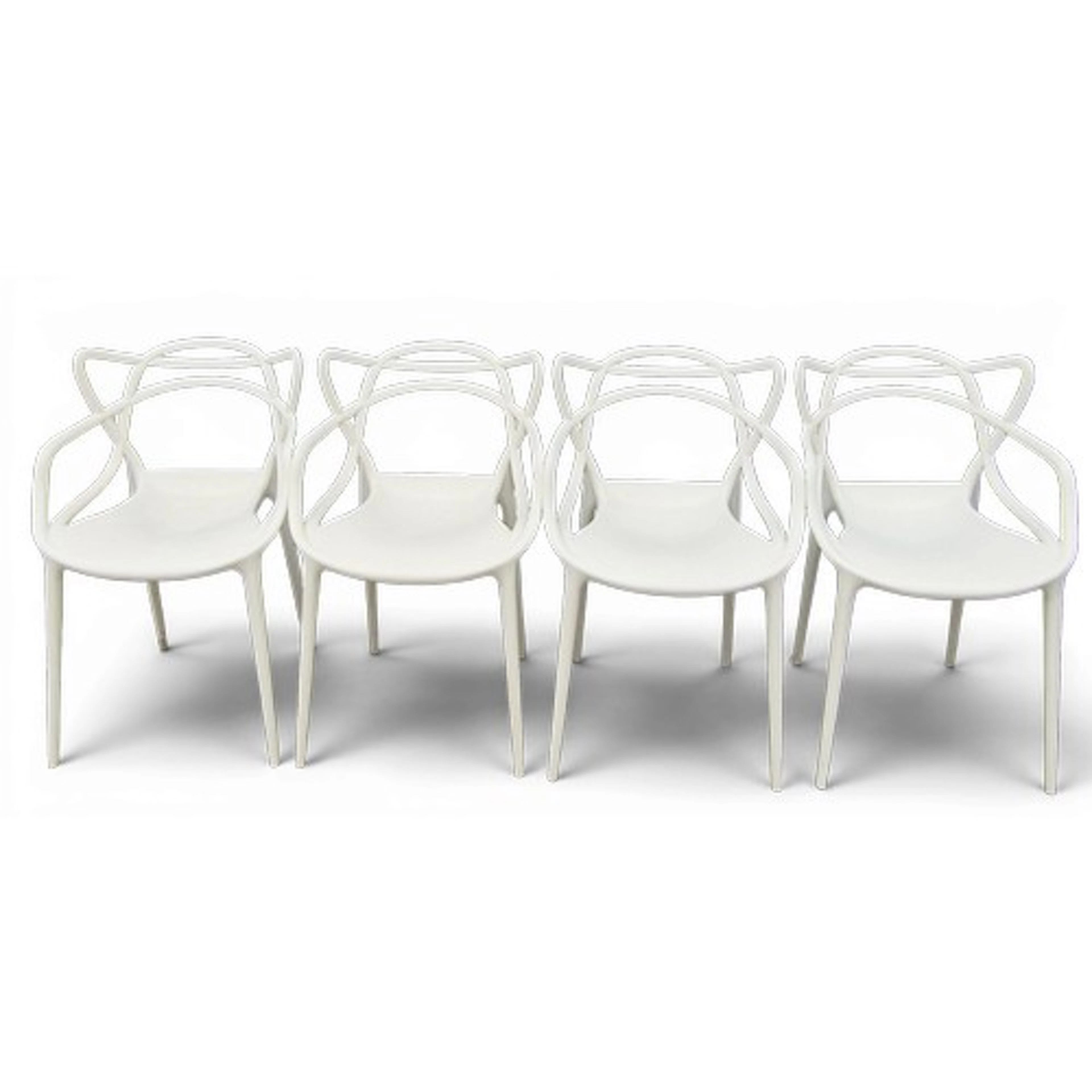 Four stackable Kartell 'Masters' armchairs designed by Phili...