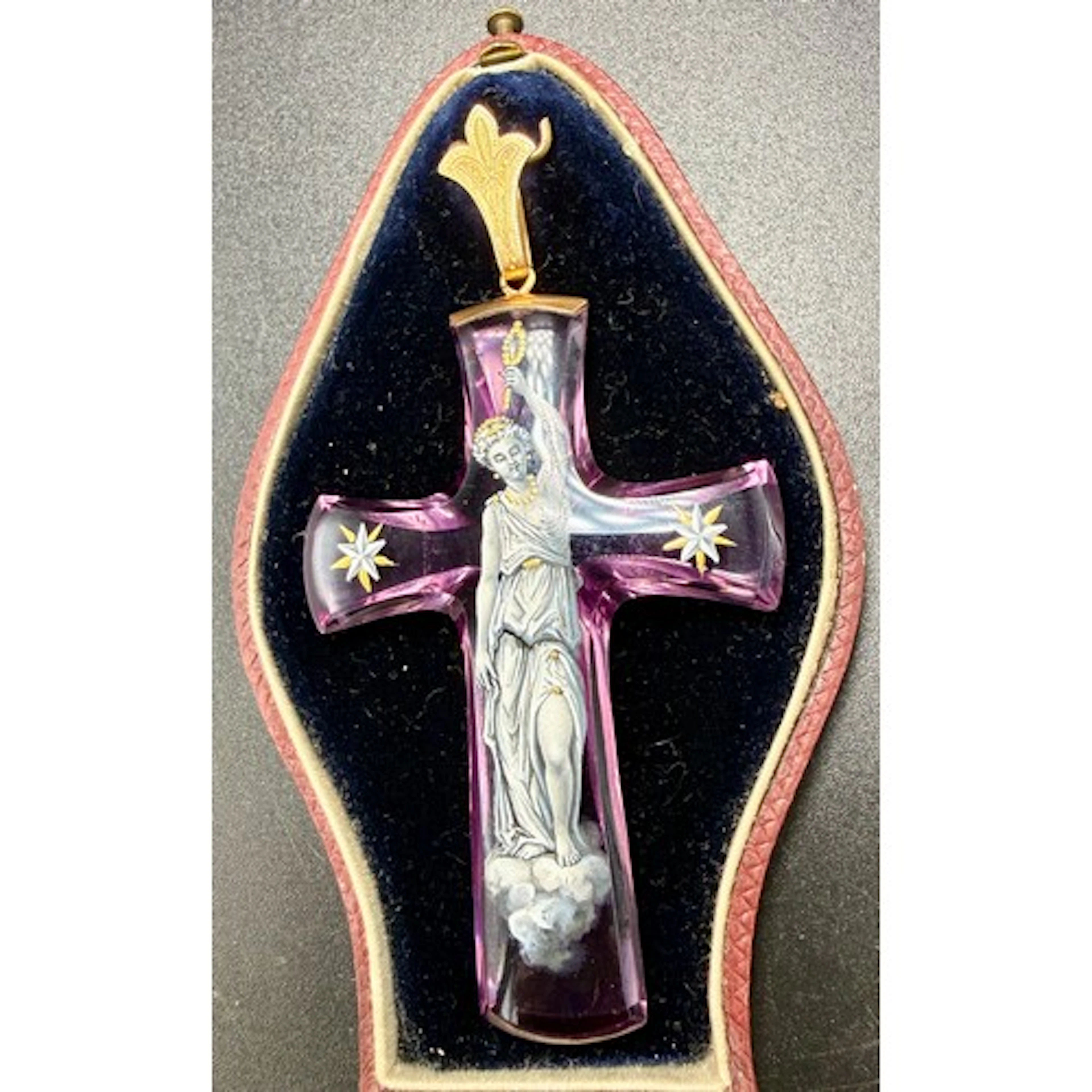 A 19thC amethyst crucifix pendant with enamel decoration and...