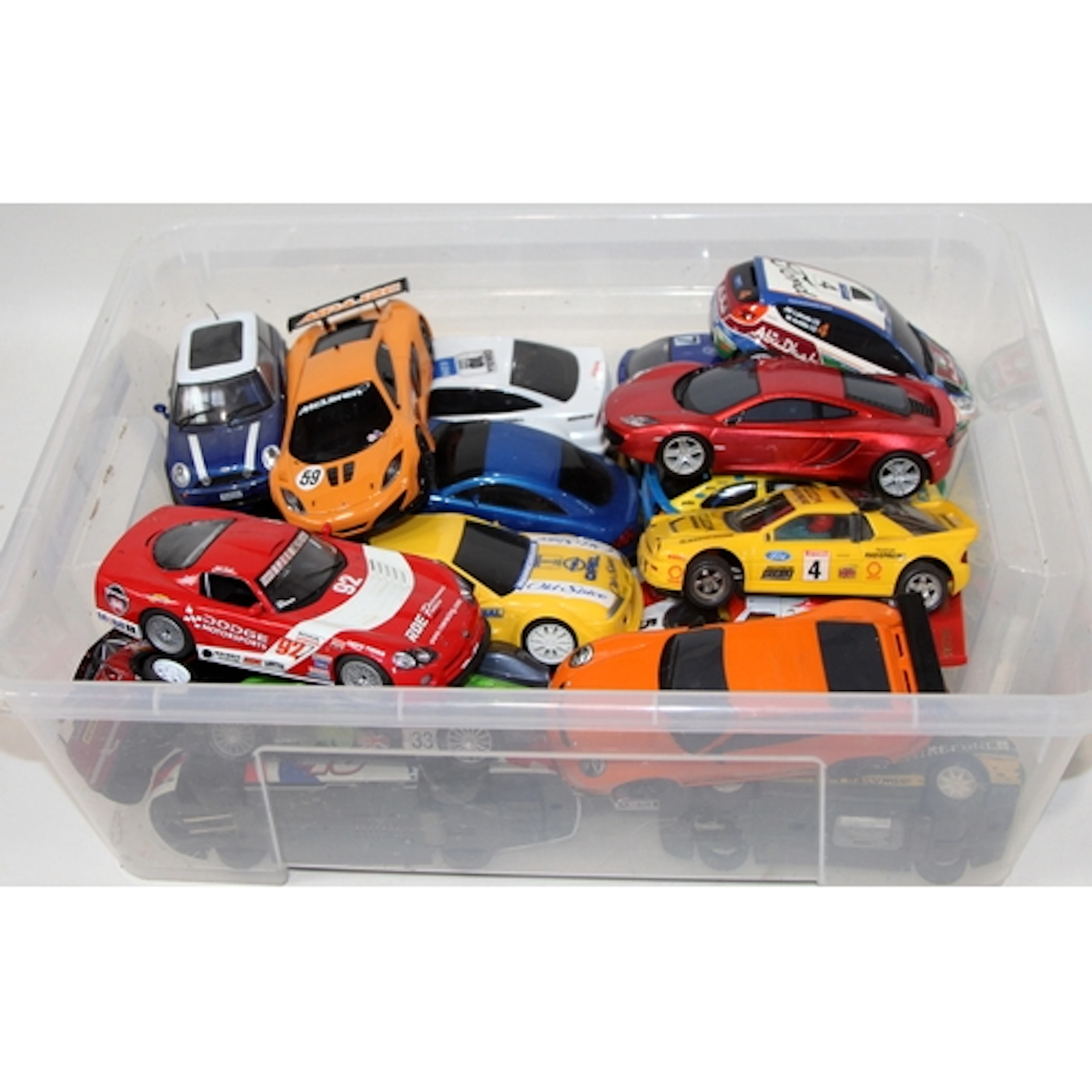 Vintage Scalextric: A carton containing a quantity of loose ...