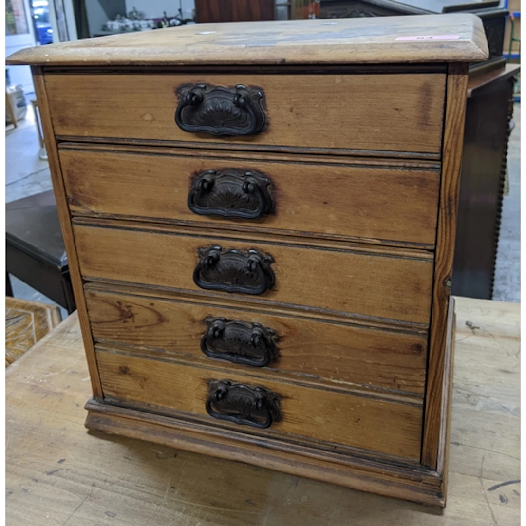 Victorian pine table top five drawer cabinet, cast iron swan...