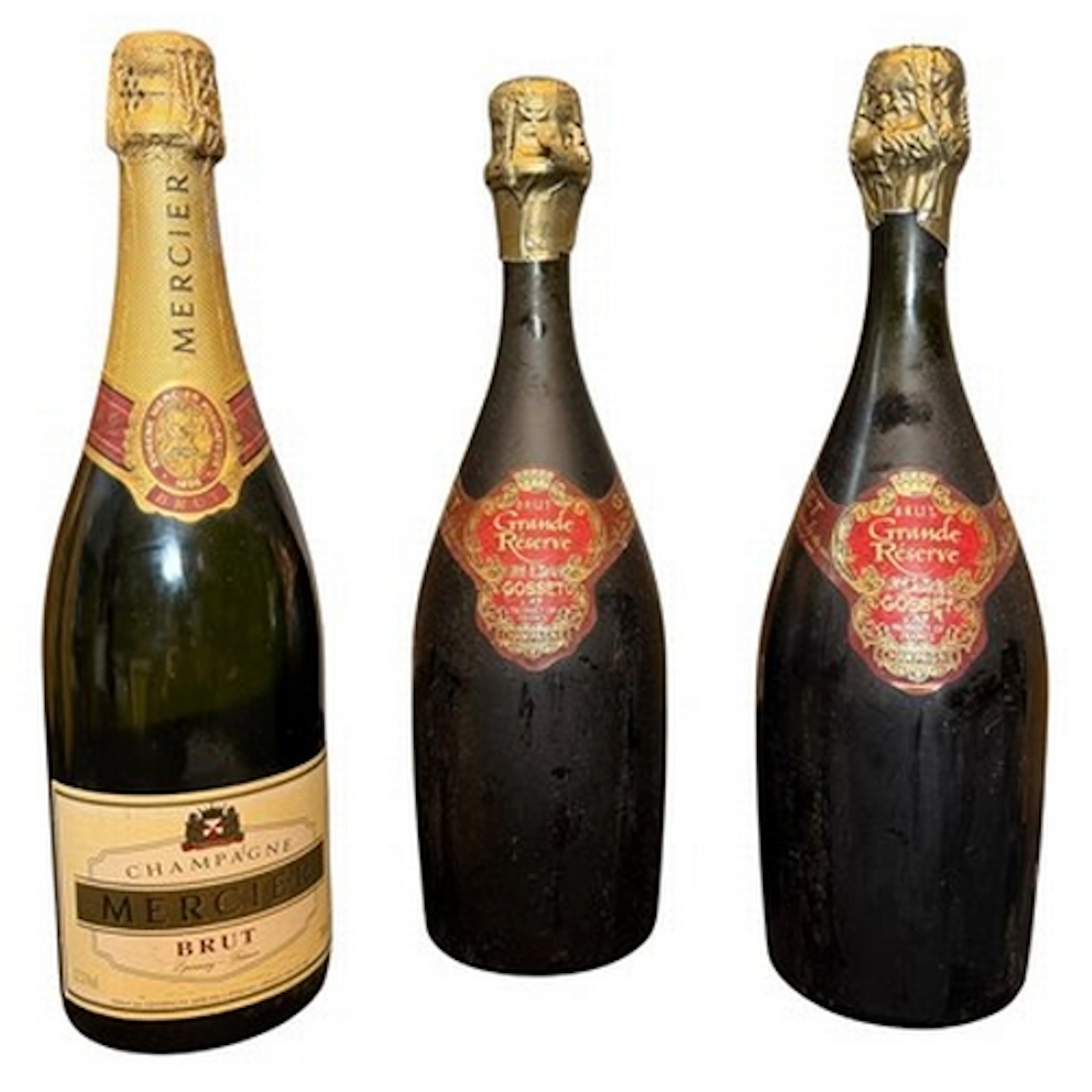 An assortment of three French champagne bottles. The lot to ...