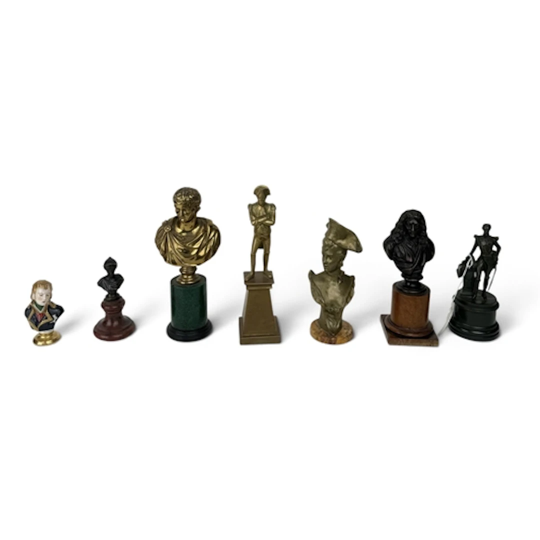 A COLLECTION OF BRONZE, PORCELAIN AND BRASS BUSTS To include...