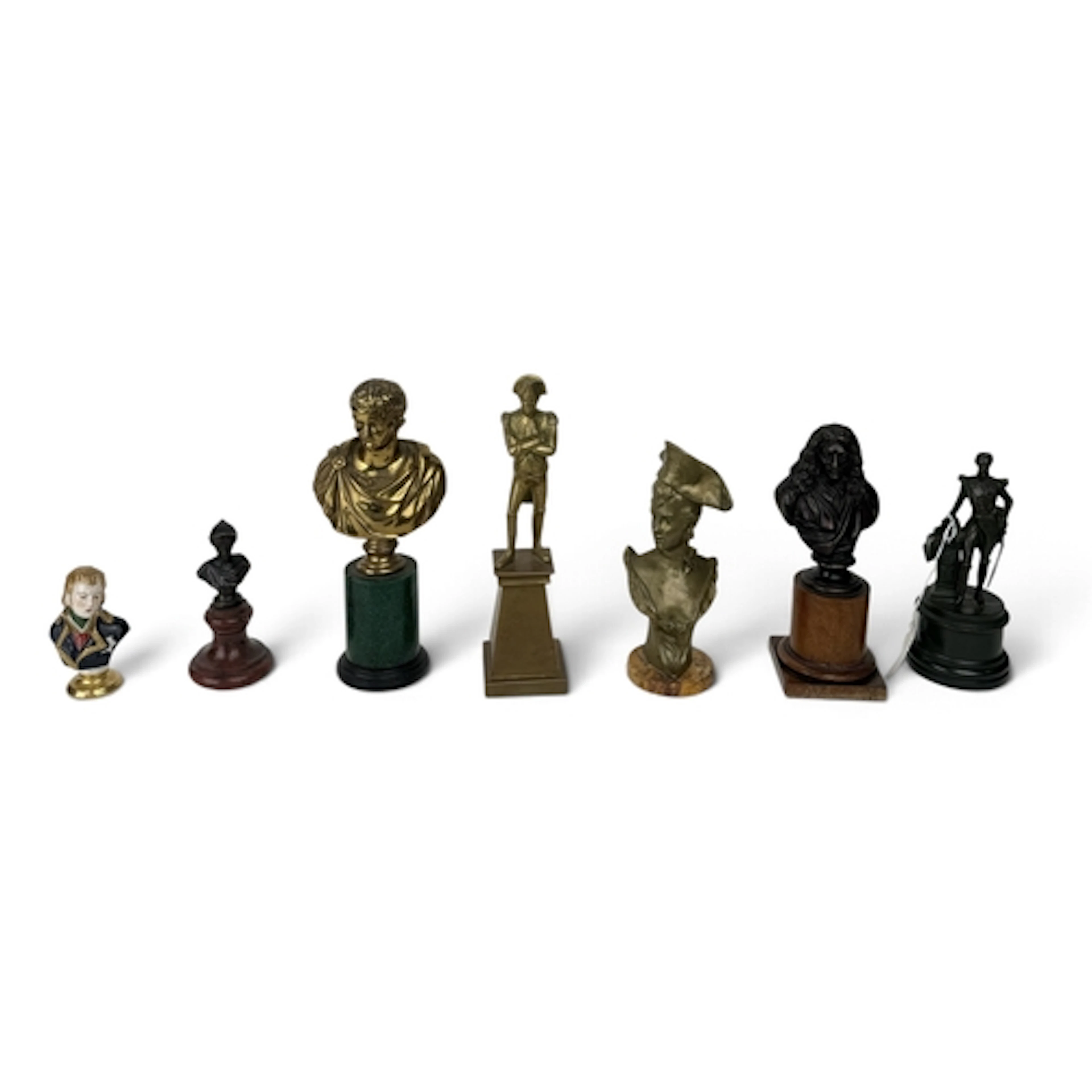 A COLLECTION OF BRONZE, PORCELAIN AND BRASS BUSTS To include...