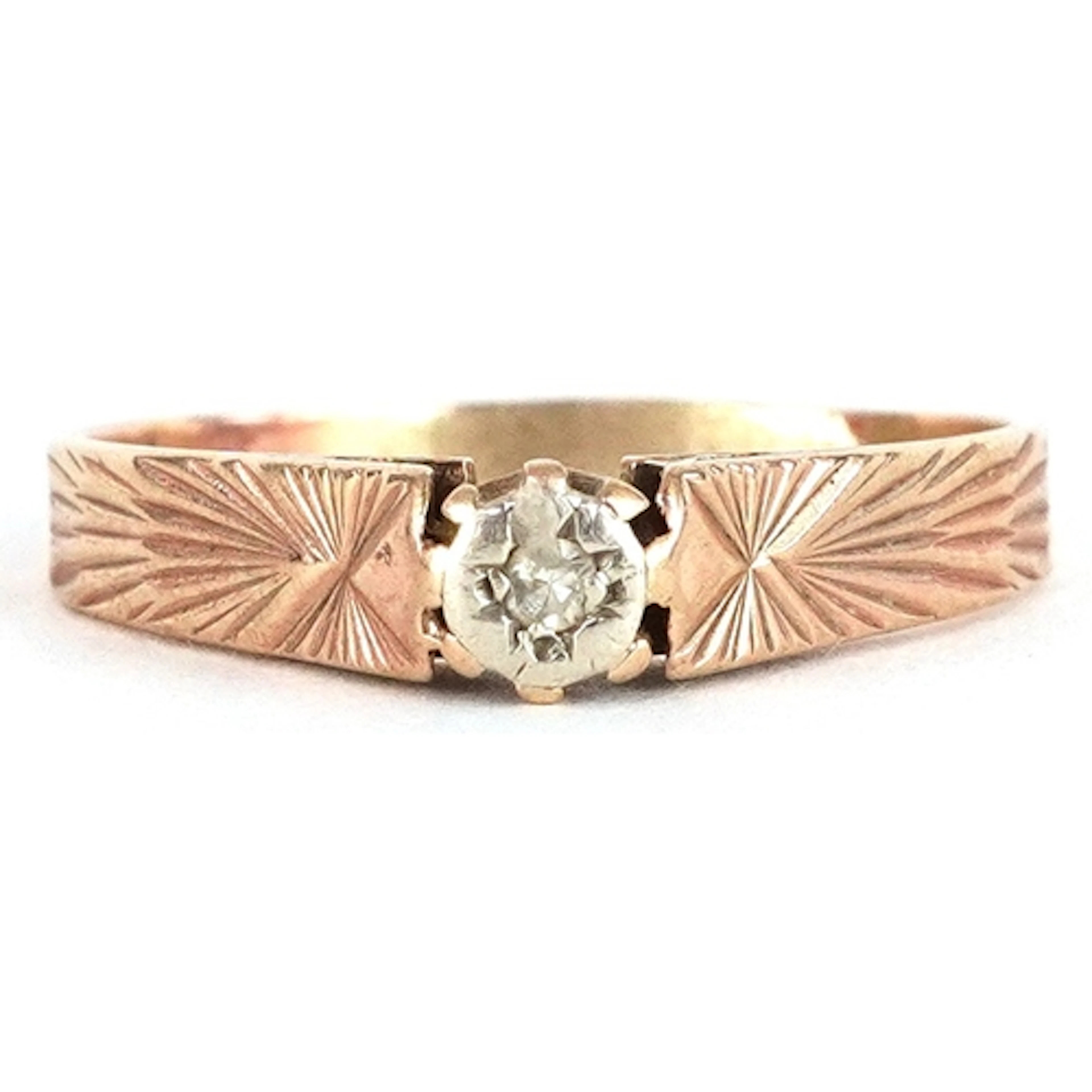 9ct rose gold diamond solitaire ring with engraved shoulders...