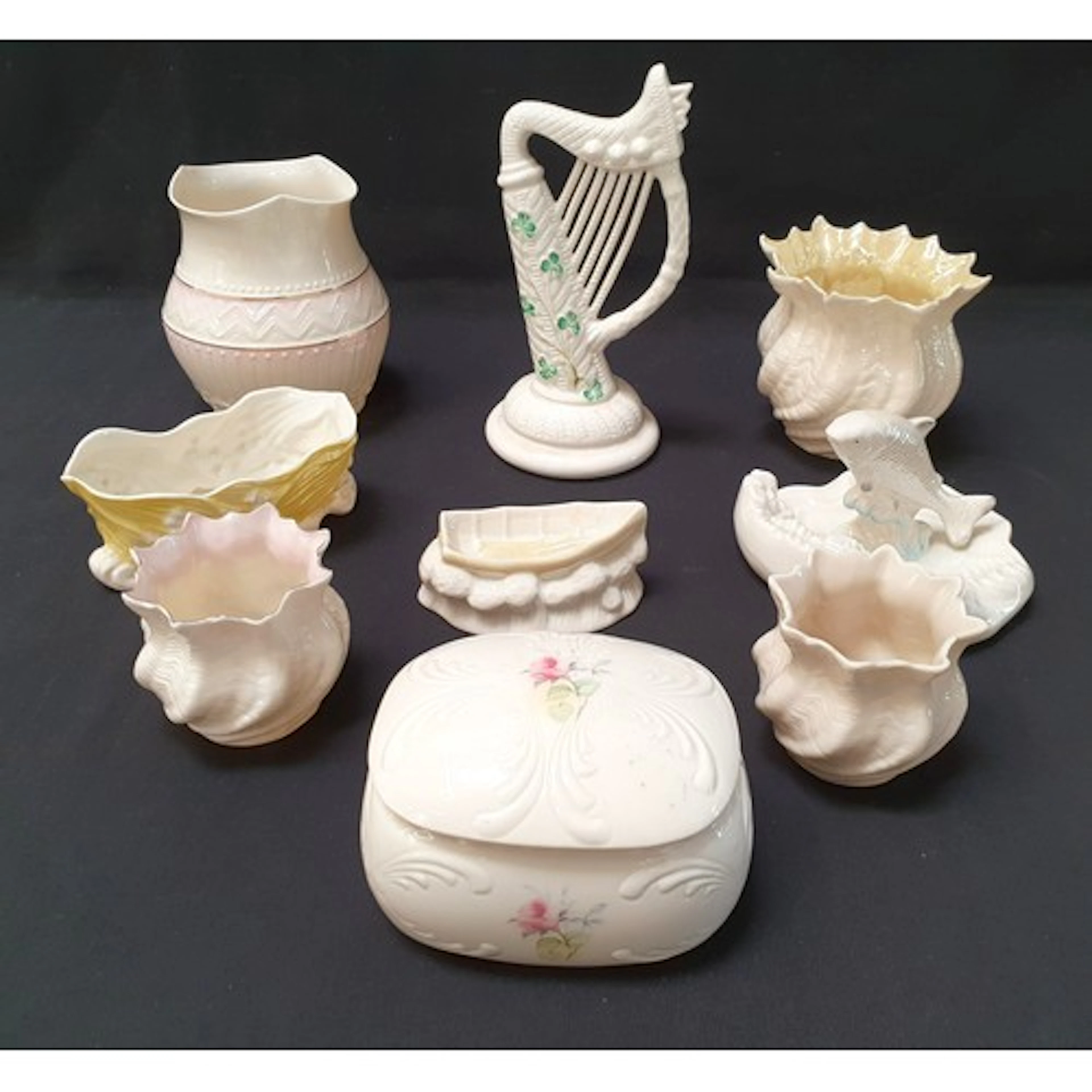 SELECTION OF BELLEEK CERAMICS including a harp with shamroc...