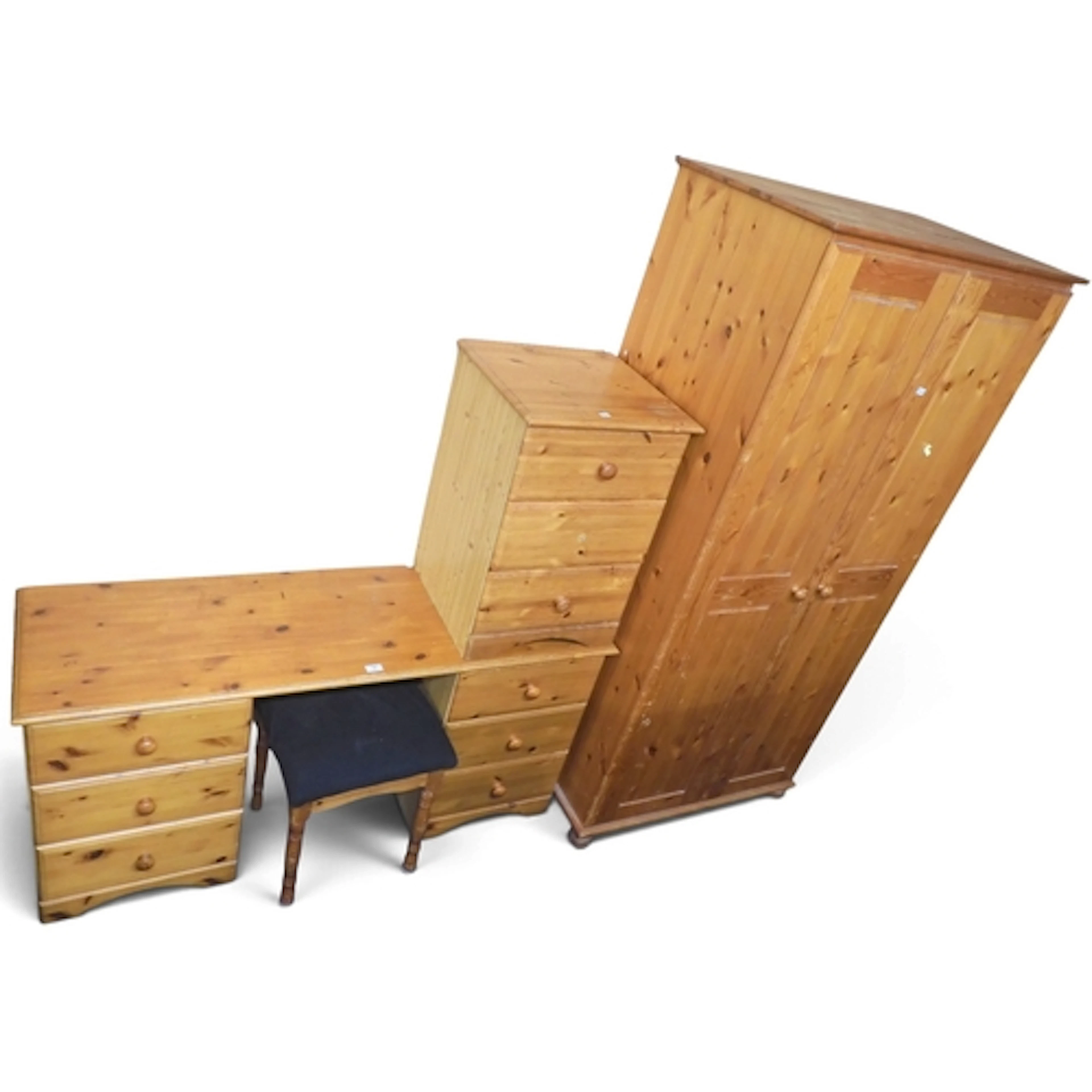 A 20th century pine bedroom suite comprising two door wardro...