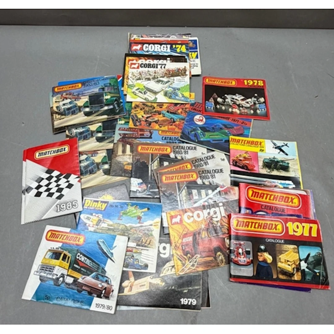 A selection of vintage diecast car advertising books and pam...