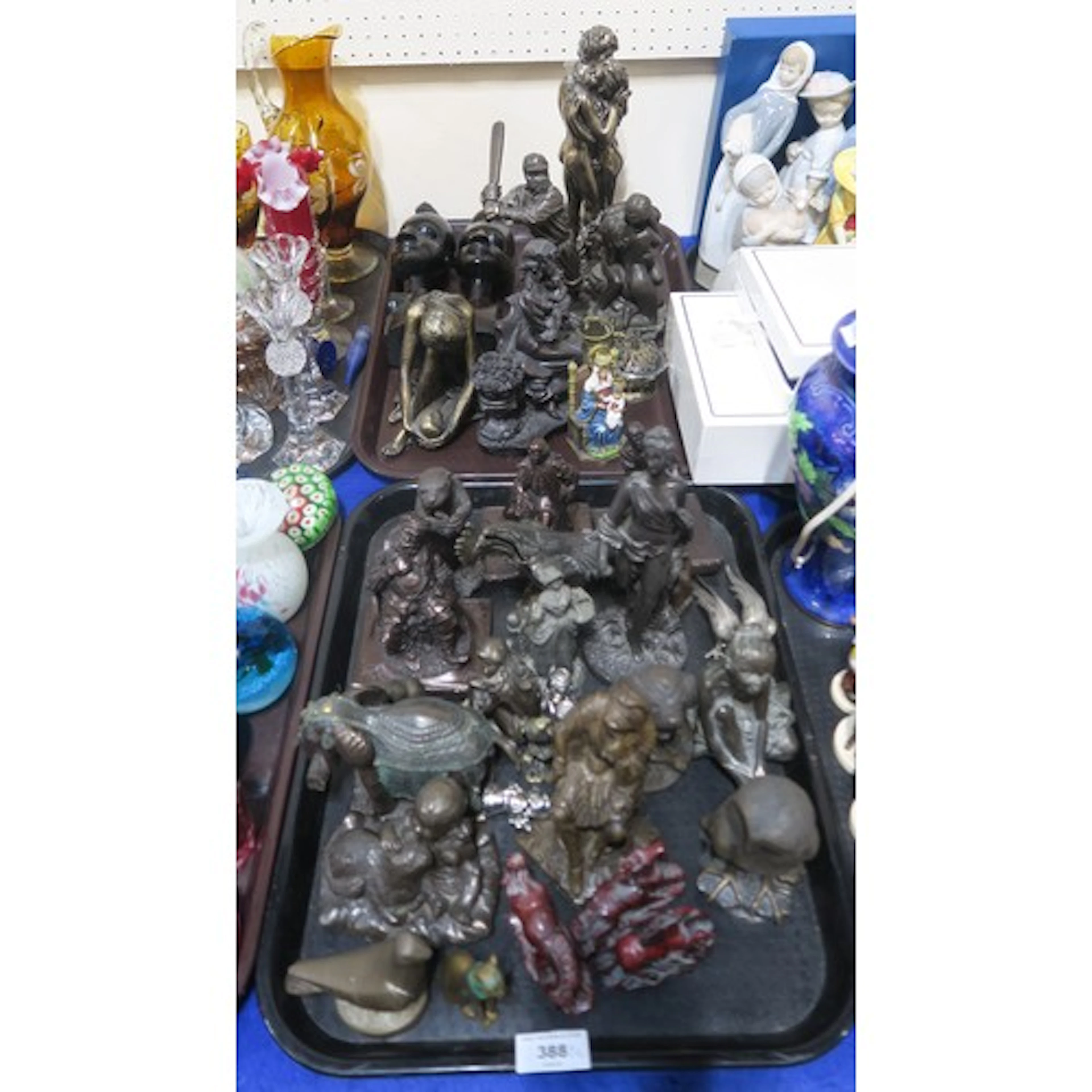 A collection of resin sculptures including Ken Nurris owl, ...