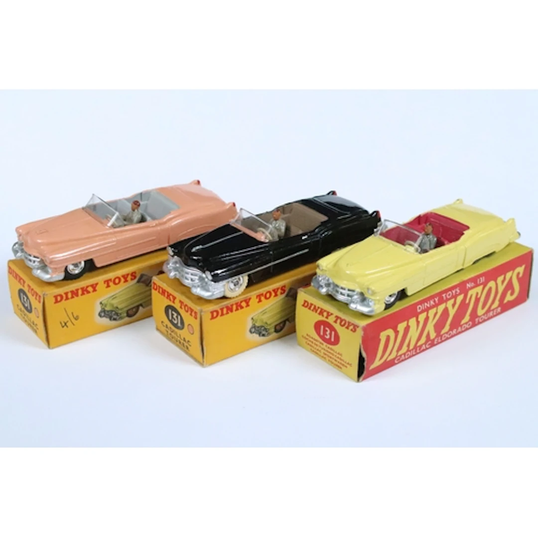 Three boxed Dinky 131 Cadillac Tourer diecast models to incl...