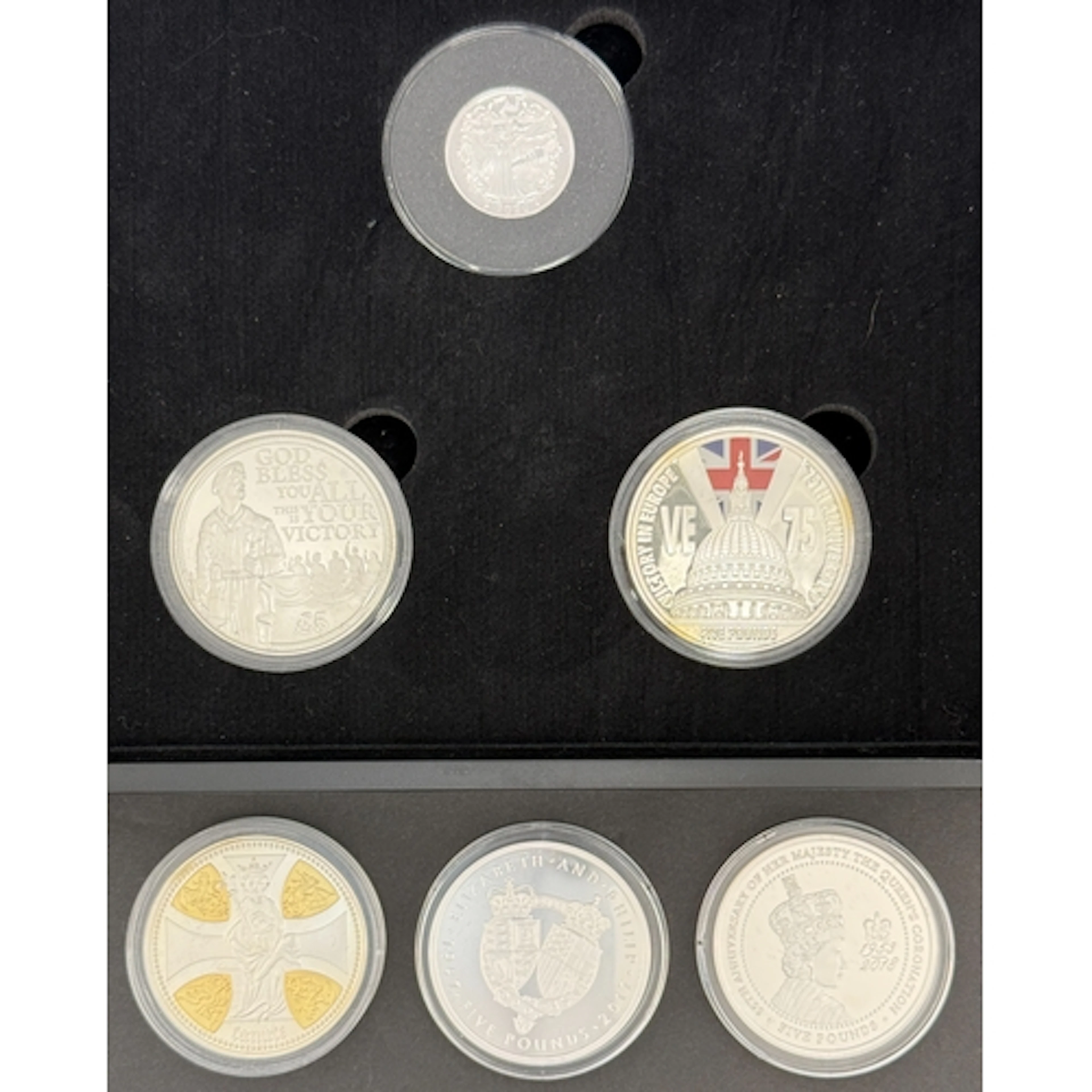 A group of six UK and Islands silver proof coins, comprising...