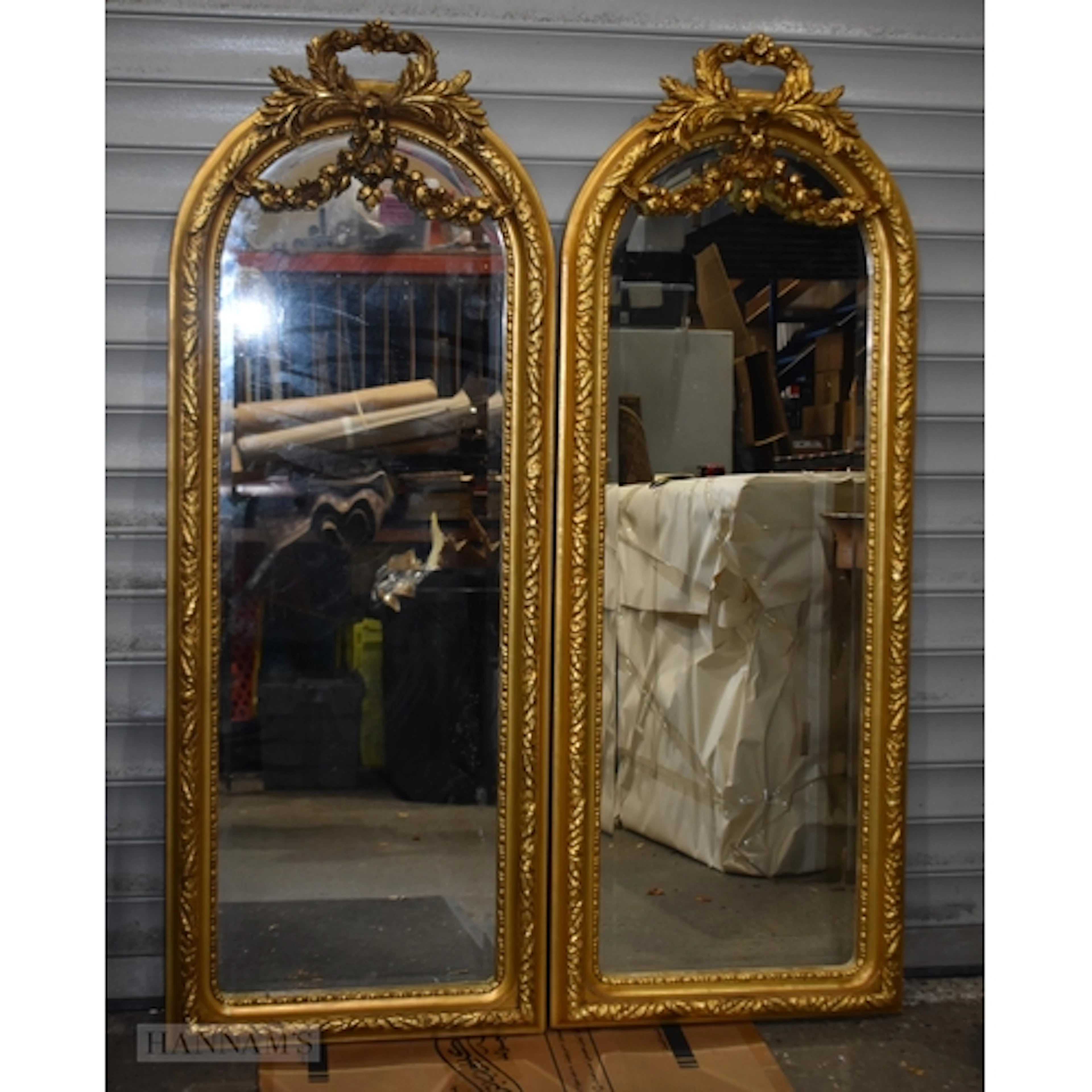 A pair of giltwood framed Baroque style mirrors 148 x 56cm...