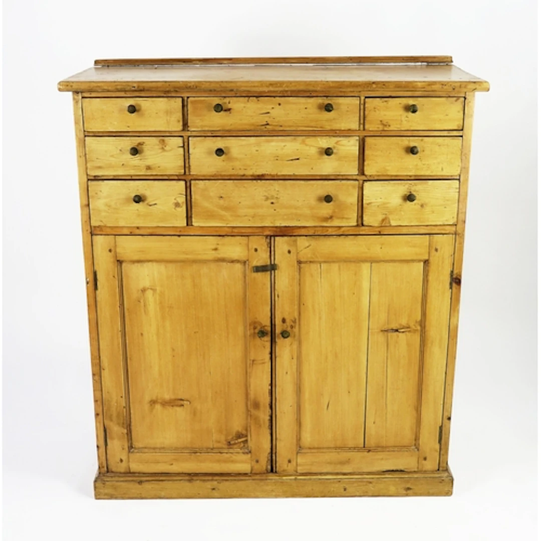 A Victorian pine sideboard, with six short drawers flanking ...