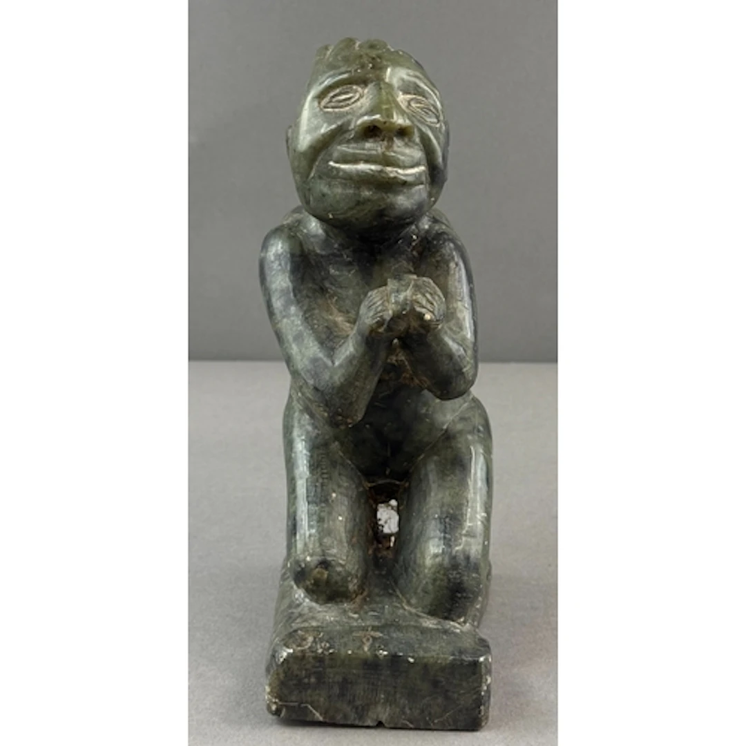 Decorative Arts: an unusual African carved green soapstone f...