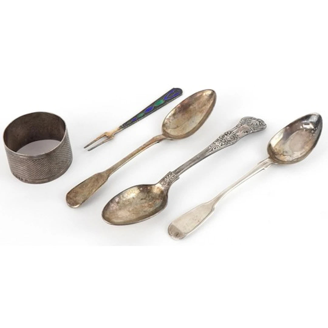 Georgian and later silver comprising three teaspoons, napkin...