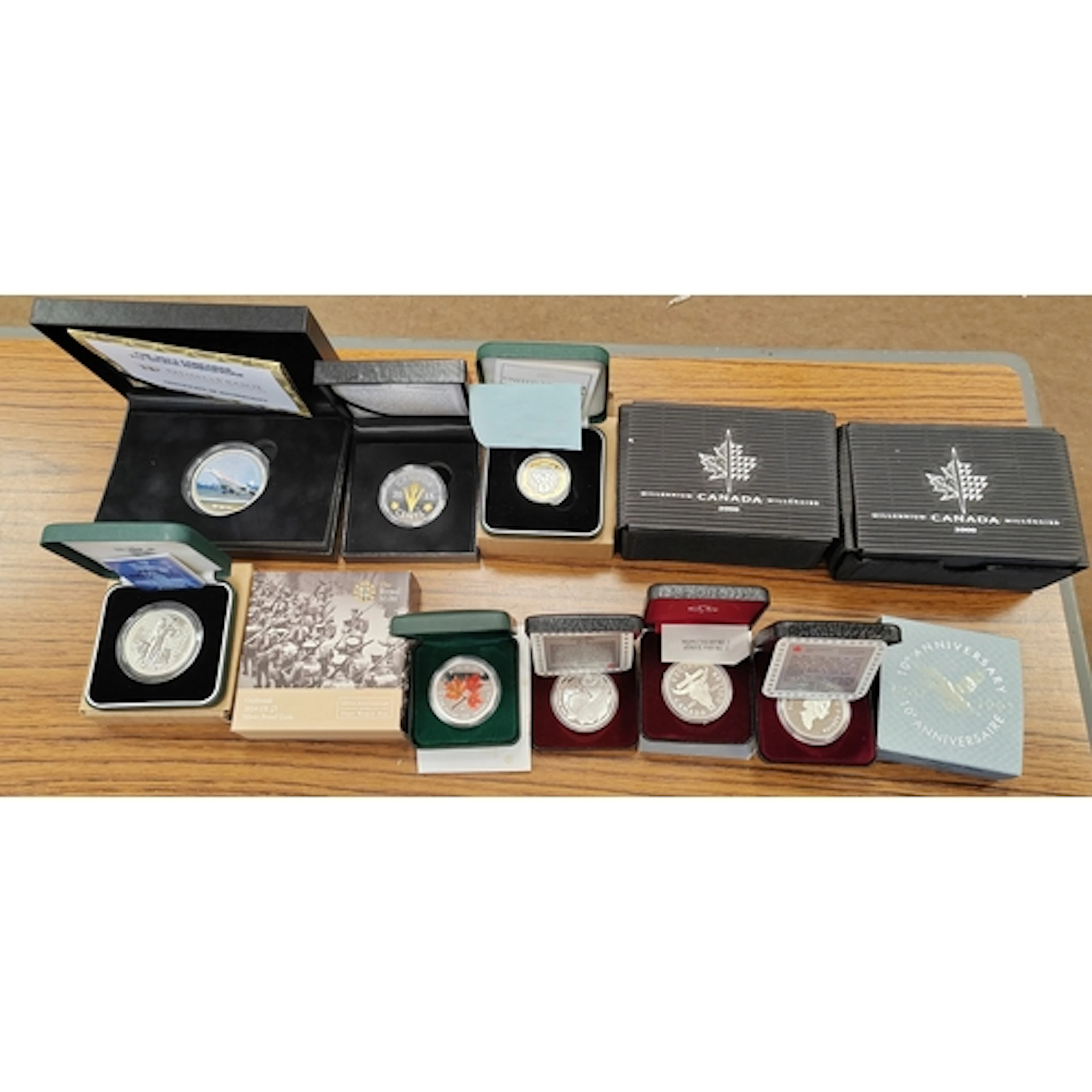 Collection of boxed silver proofs FDC, with Canada 1982 $1, ...