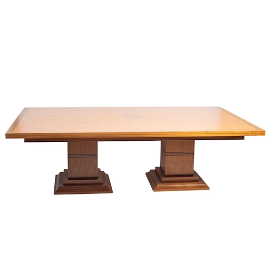 A walnut twin pedestal dining table, modern. The rectangular...