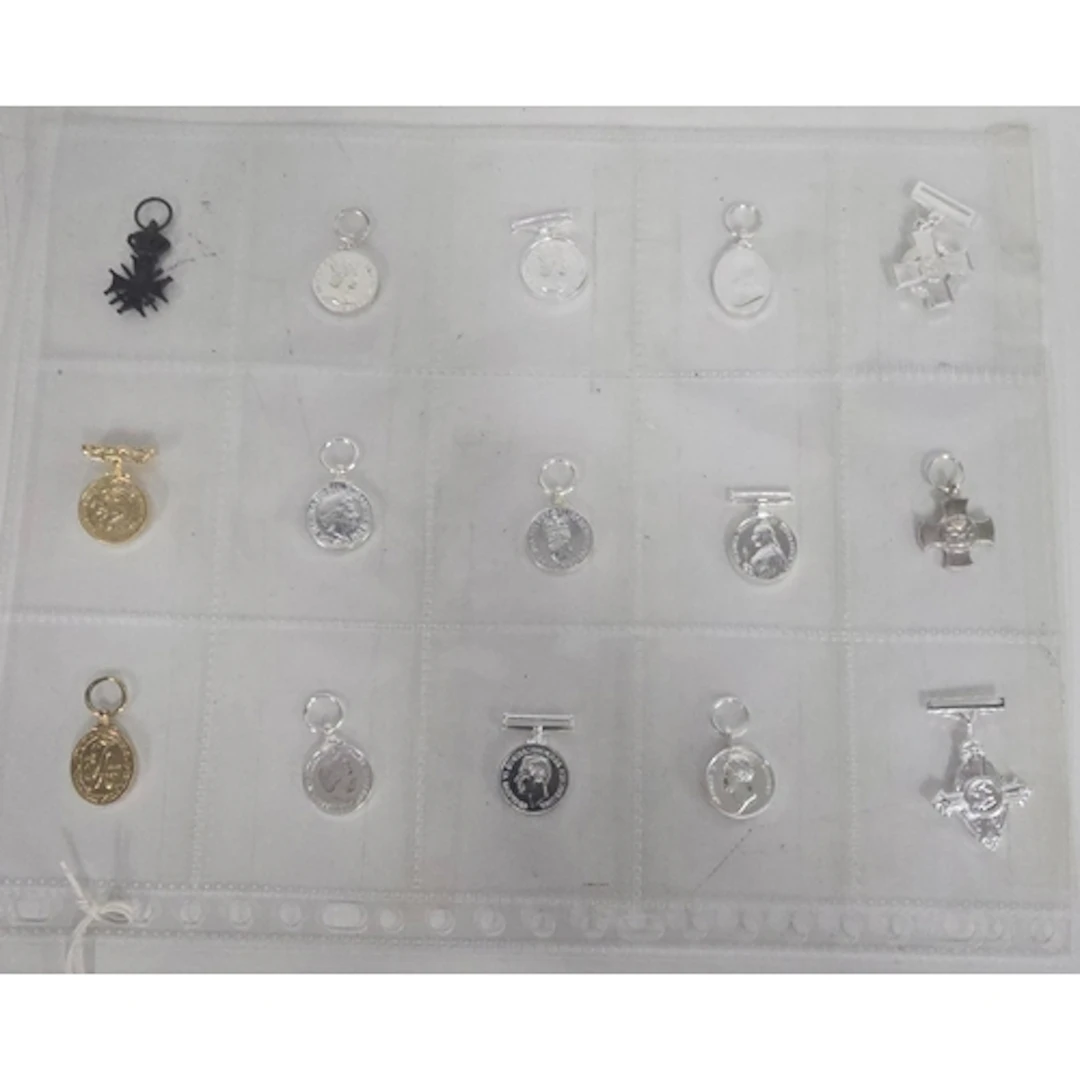 Fifteen miniature medals, including Conspicuous Gallantry Cr...