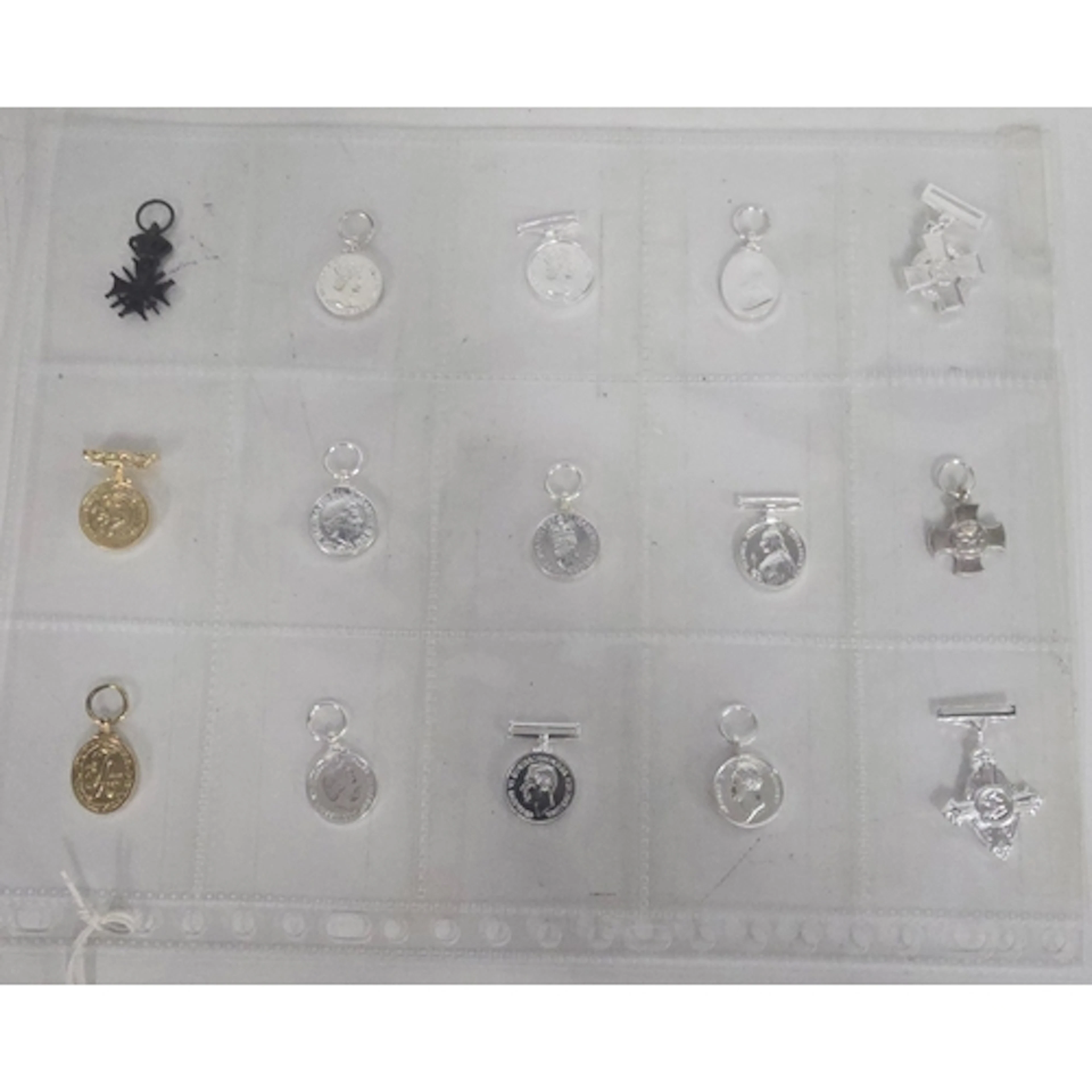 Fifteen miniature medals, including Conspicuous Gallantry Cr...
