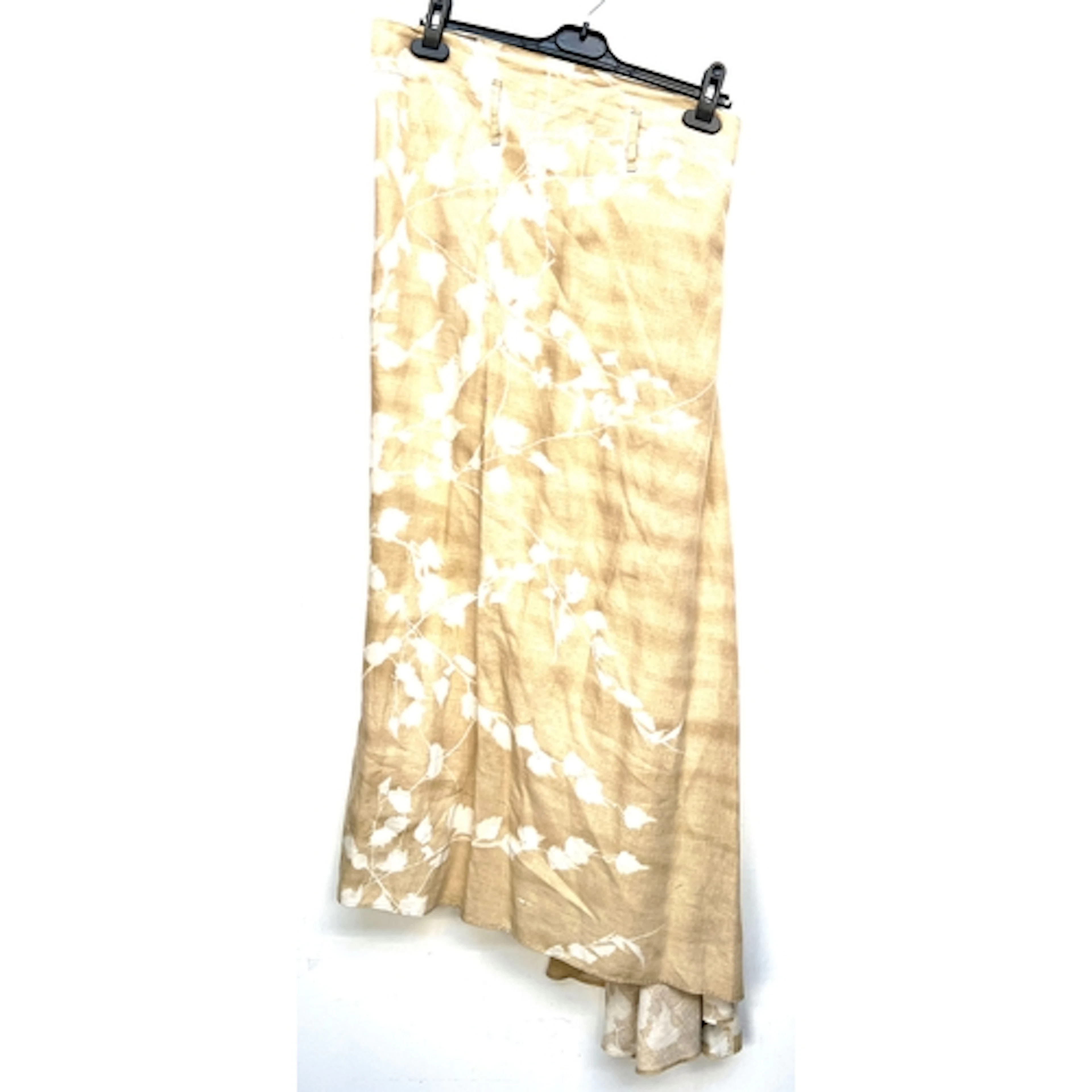 A Sarah Sturgeon beige and white floral print linen skirt wi...