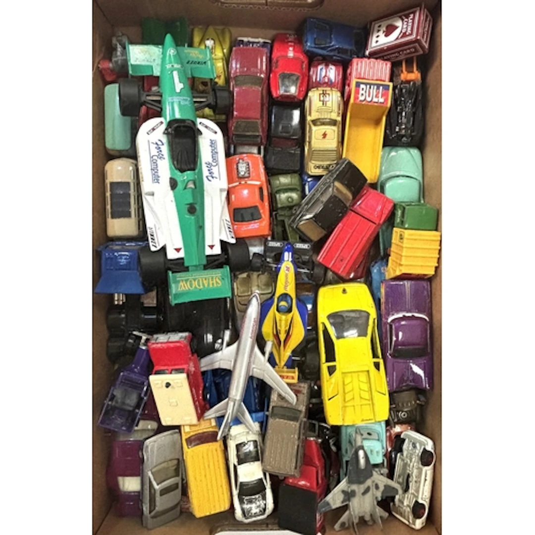 A collection of die cast collectable toy cars and a Kandy To...
