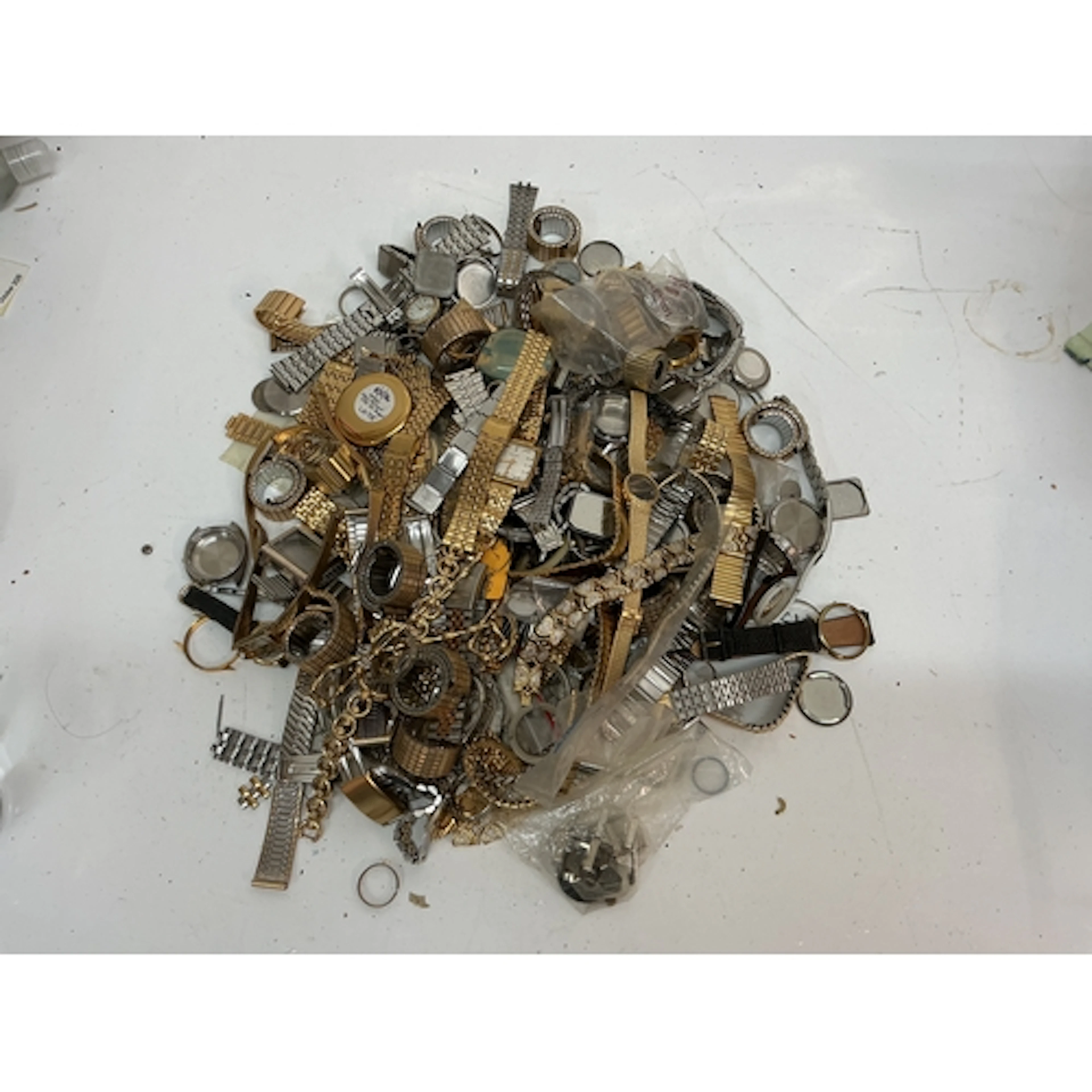 A quantity of bracelet watch straps and cases