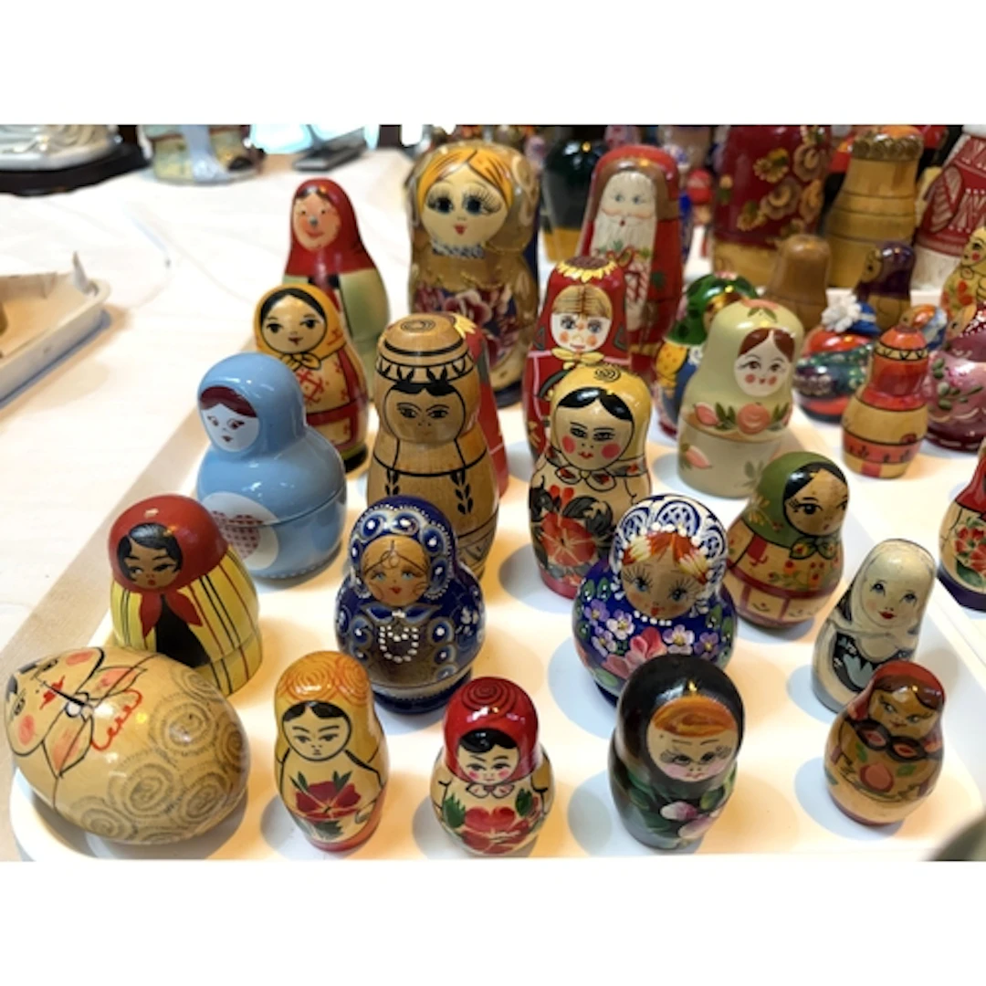 A collection of Russian Matryoshka Doll wooden nests - varyi...