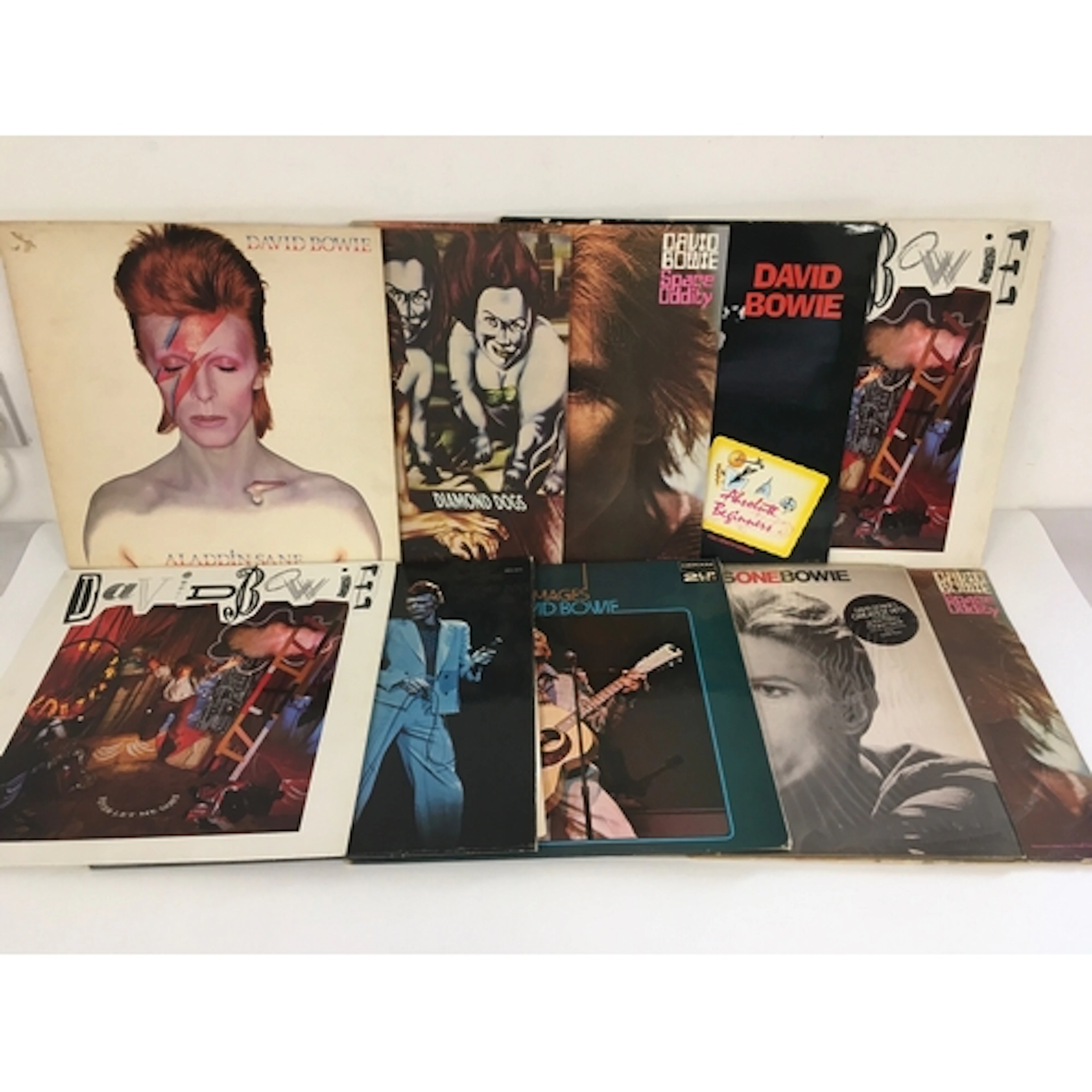 Ten David Bowie LPs and 12" singles comprising Aladdin Sane,...