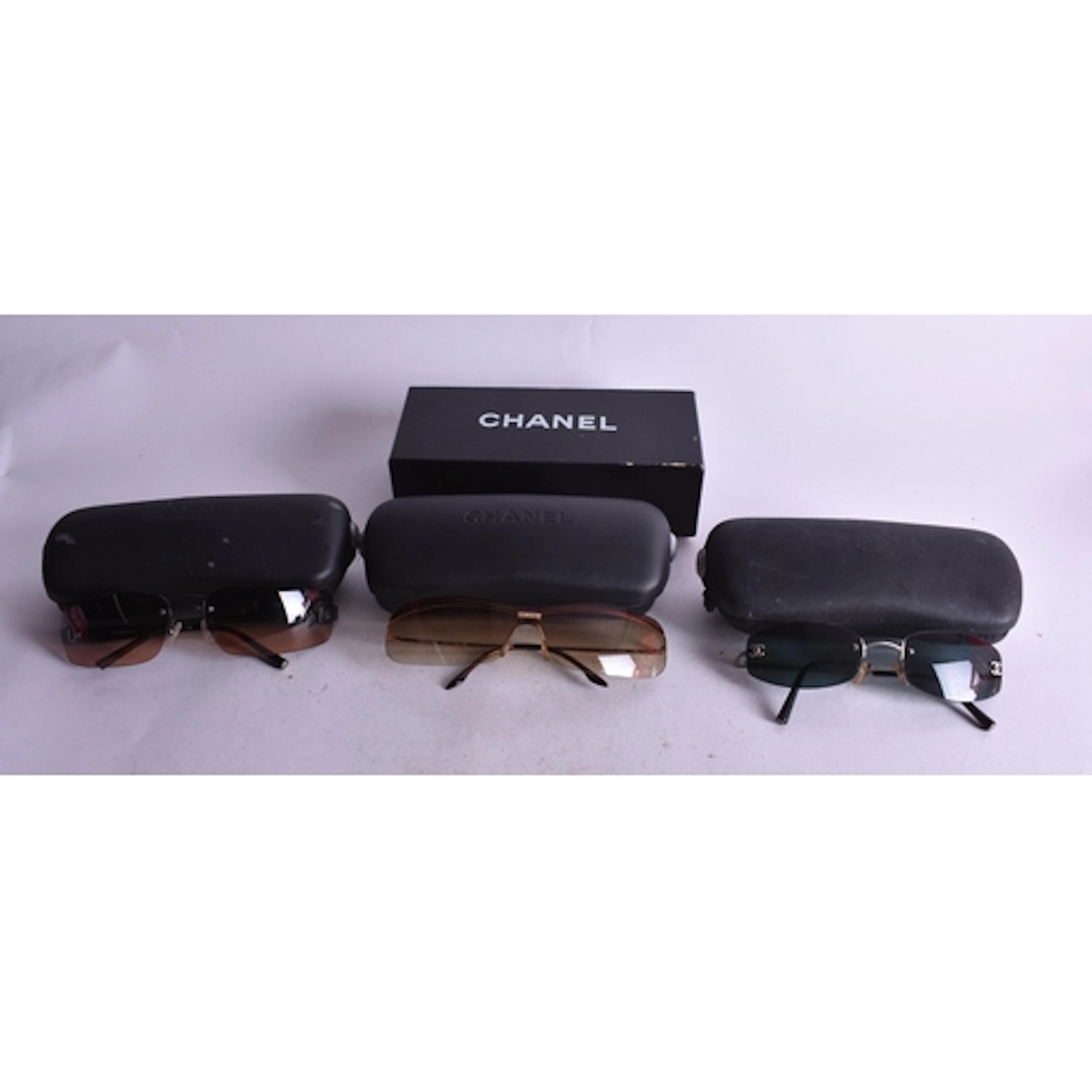 Four Vintage Pairs of Chanel Sunglasses in original Cases.