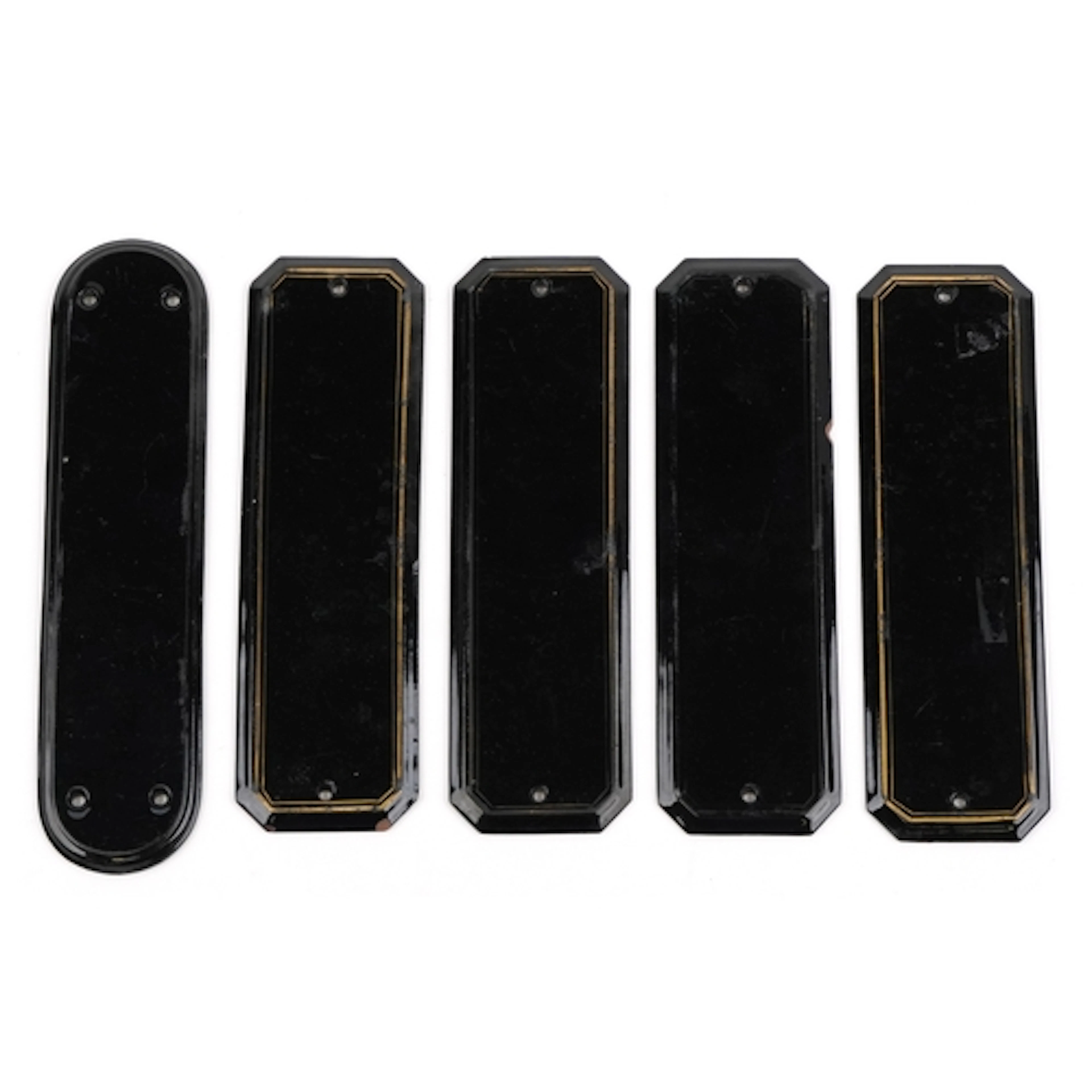 Five Victorian black glazed terracotta door plates, each bea...
