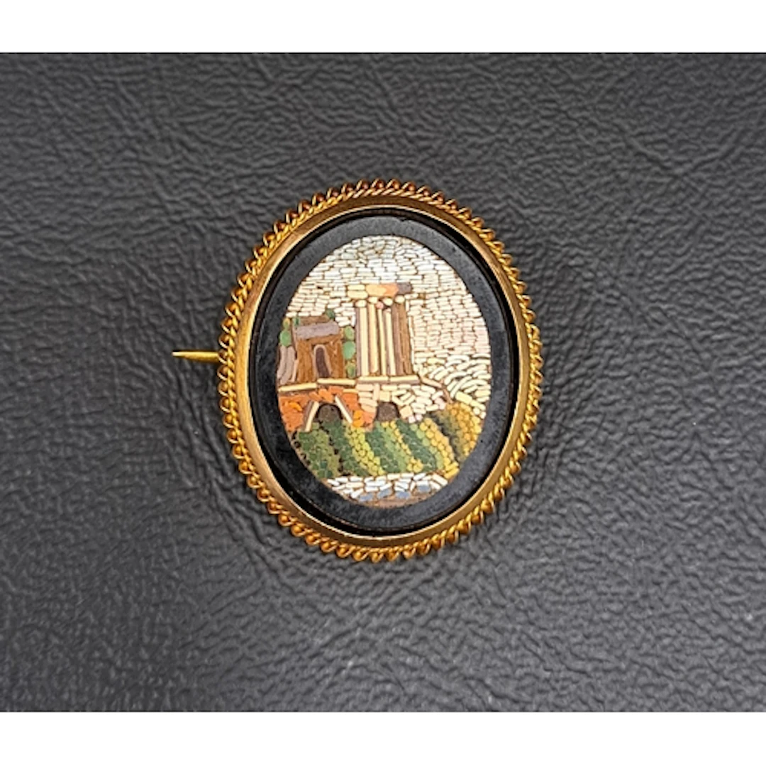 VICTORIAN MICROMOSAIC BROOCH depicting Roman ruins, in eight...