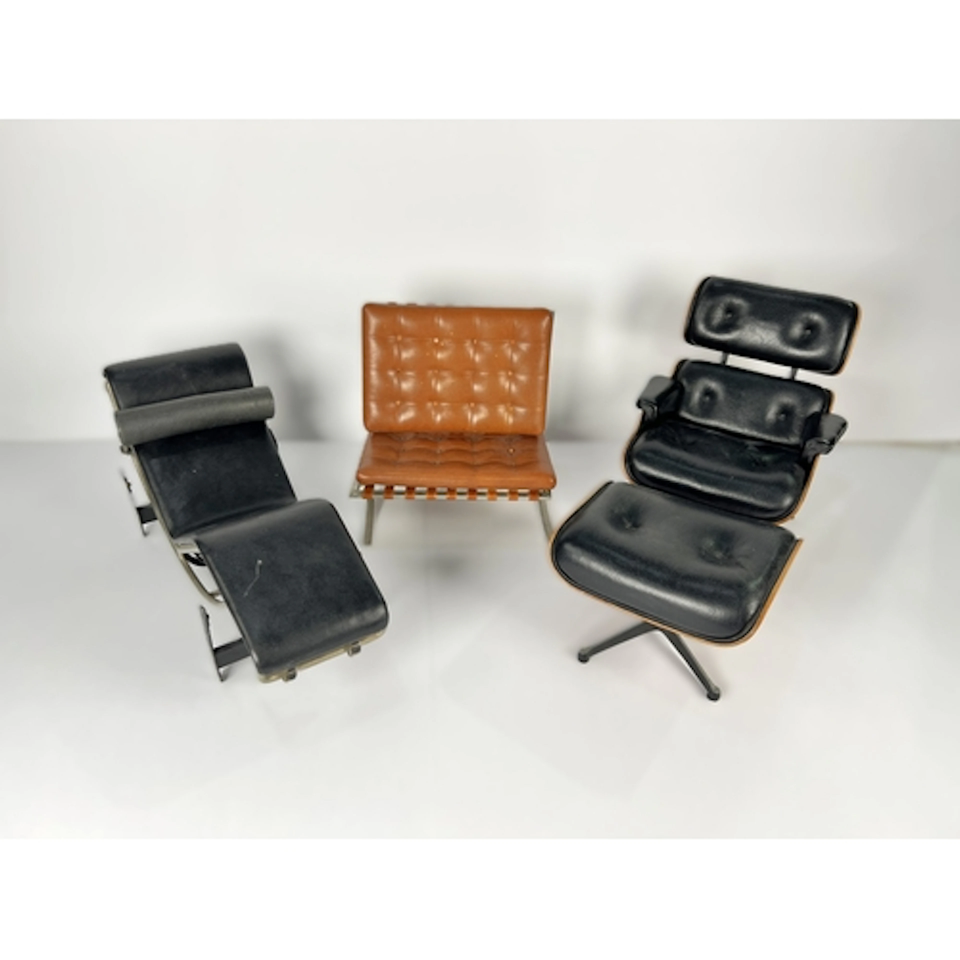 VITRA DESIGN MUSEUM MINIATURES: an Eames Lounge chair and Ot...