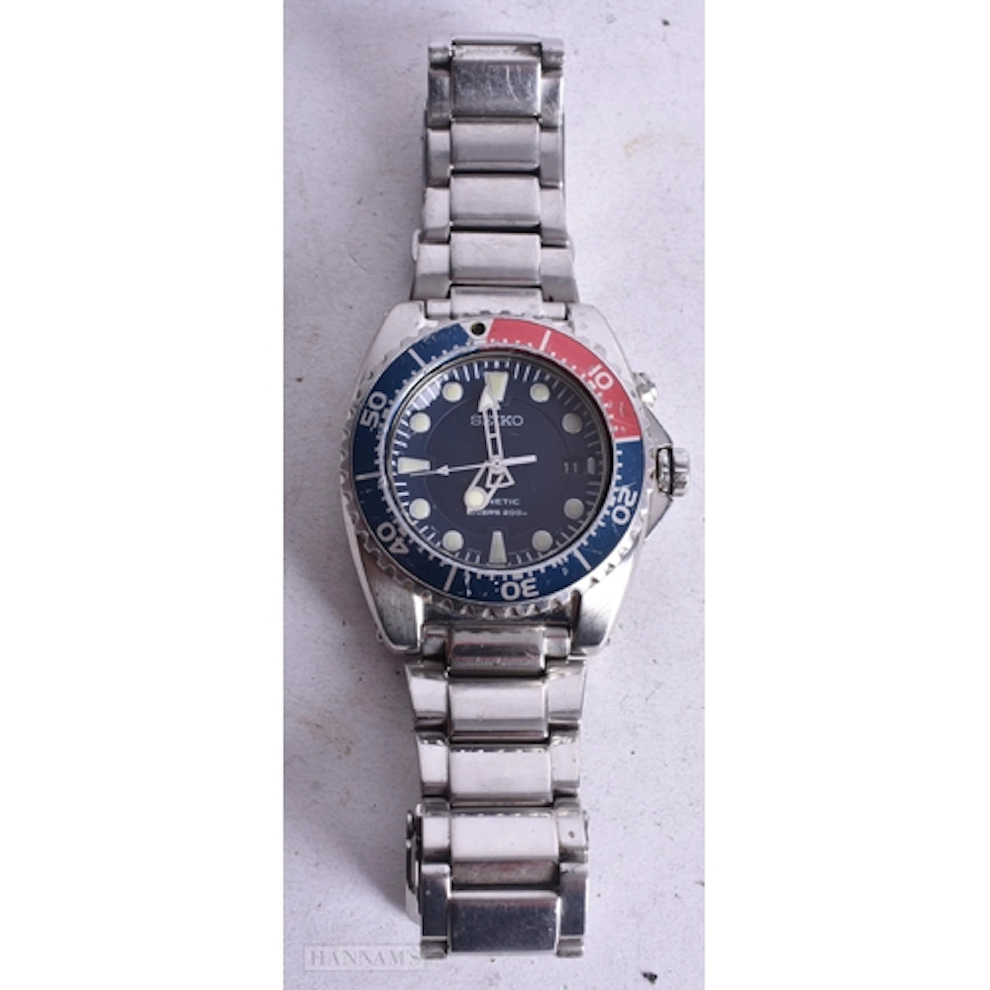 A Seiko Kinetic Divers Watch with Pepsi Dial. 4.8cm incl Di...