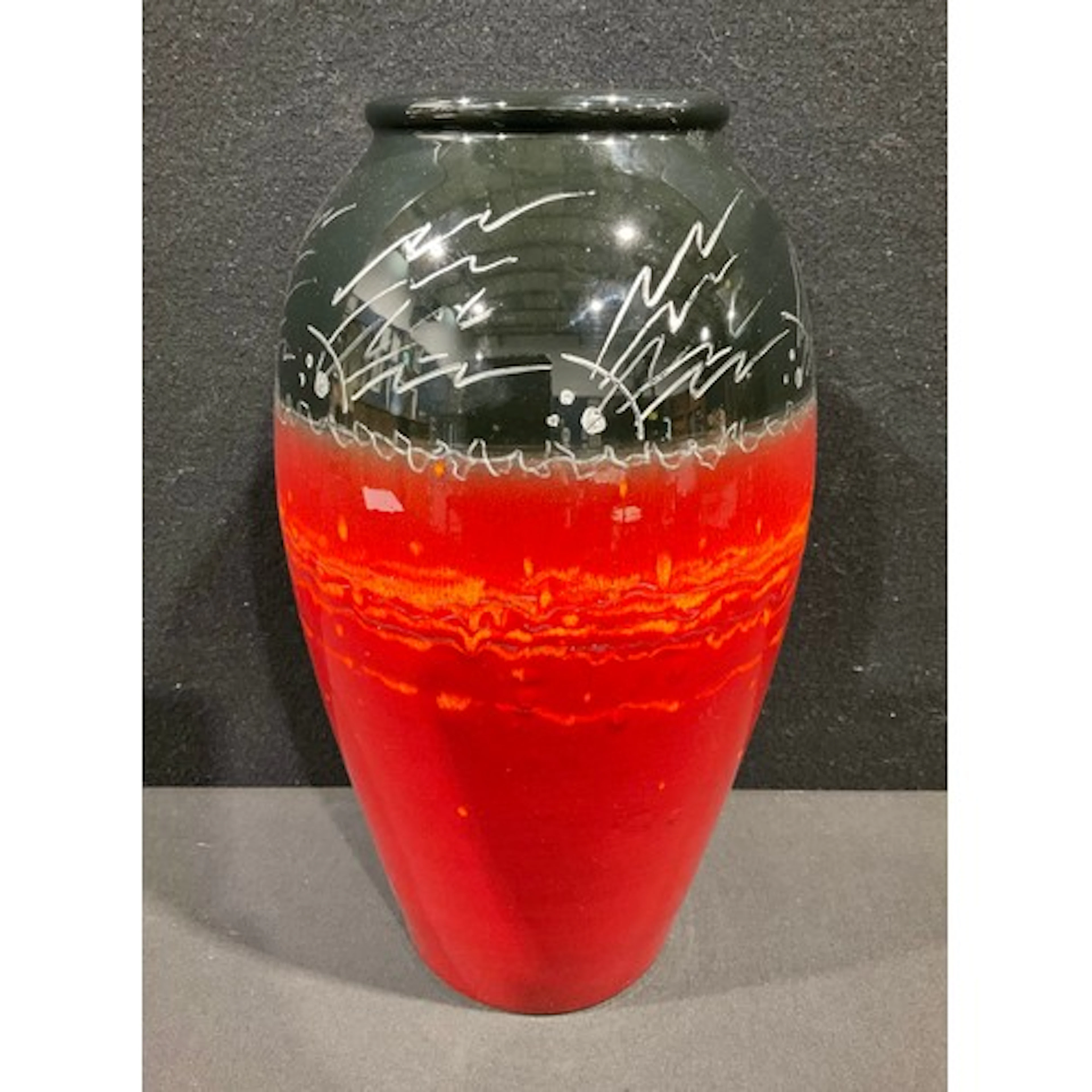 An Alan Clarke Poole pottery living glaze vase, signed and d...