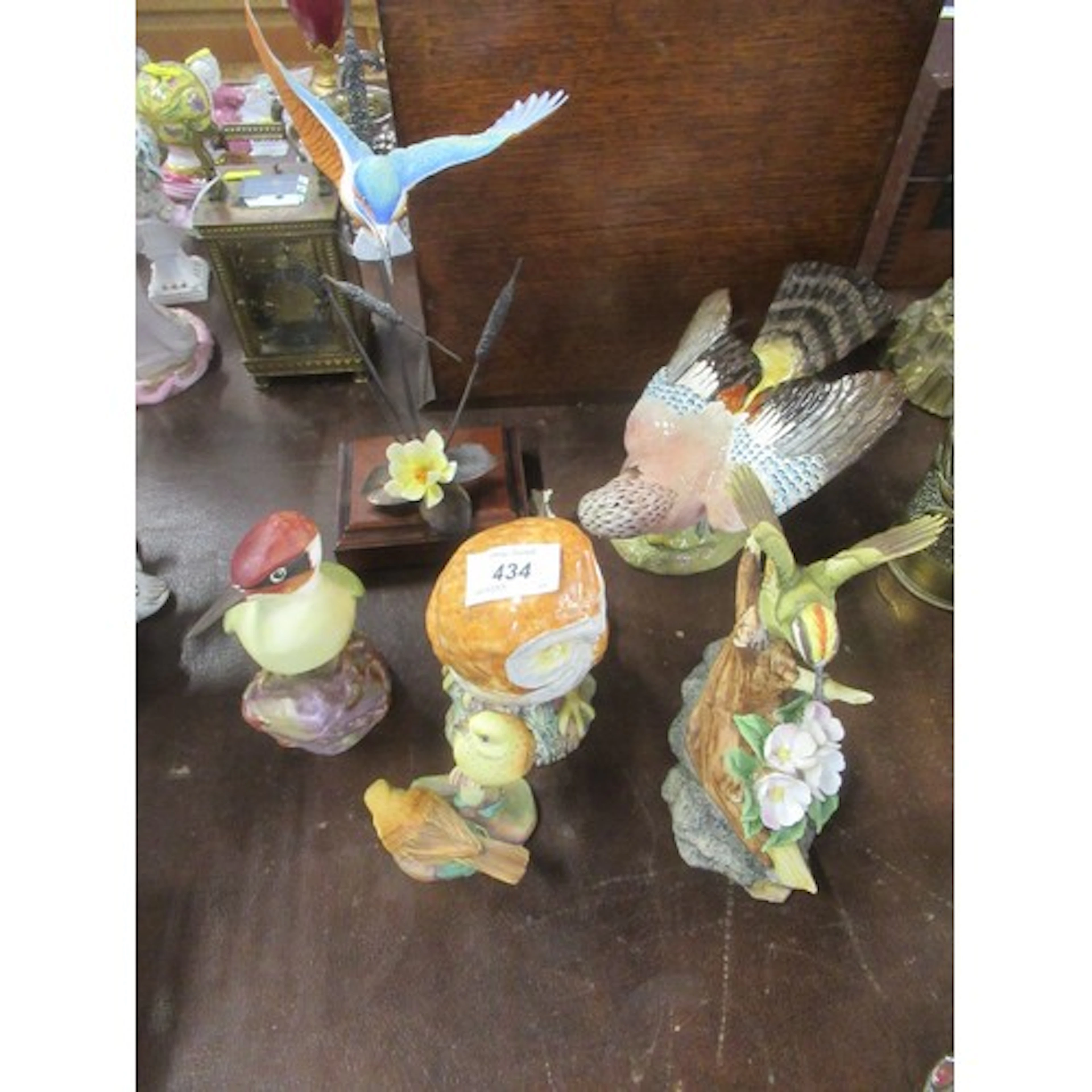 A collection of model birds, including Royal Worcester and B...