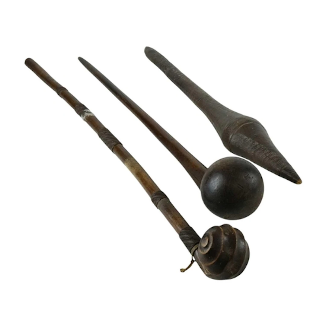An Aboriginal fighting club or waddi. Length 66cm. Together ...
